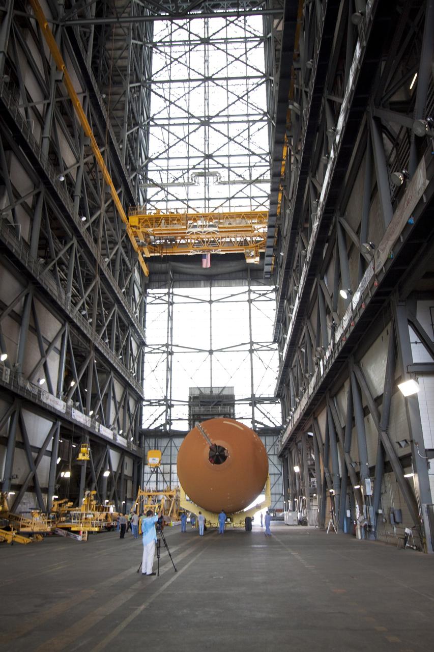 CAPE CANAVERAL, Fla. -- The Space Shuttle Program's last external fuel tank, ET-122, has been moved inside the Vehicle Assembly Building at NASA's Kennedy Space Center in Florida. The tank traveled 900 miles by sea from NASA's Michoud Assembly Facility in New Orleans to Kennedy's Turn Basin aboard the Pegasus Barge. The tank eventually will be attached to space shuttle Endeavour for the STS-134 mission to the International Space Station. STS-134, targeted to launch in Feb. 2011, currently is scheduled to be the last mission in the shuttle program.           The tank, which is the largest element of the space shuttle stack, was damaged during Hurricane Katrina in August 2005 and restored to flight configuration by Lockheed Martin Space Systems Company employees. Photo credit: NASA/Jack Pfaller