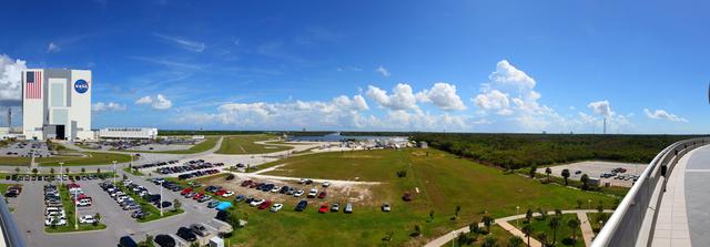 CAPE CANAVERAL, Fla. -- This panoramic image shows the Launch Complex 39 area at NASA's Kennedy Space Center in Florida. In the far background is the Pegasus Barge carrying the Space Shuttle Program's last external fuel tank, ET-122, into Kennedy's Turn Basin. Once docked, the tank will be offloaded from the barge and transported to the Vehicle Assembly Building (VAB). NASA's Liberty Star solid rocket booster retrieval ship also is docked at the Turn Basin. The tank traveled 900 miles by sea, carried in the barge, from NASA's Michoud Assembly Facility in New Orleans. Once inside the VAB, it eventually will be attached to space shuttle Endeavour for the STS-134 mission to the International Space Station targeted to launch Feb. 2011. STS-134 currently is scheduled to be the last mission in the shuttle program. The tank, which is the largest element of the space shuttle stack, was damaged during Hurricane Katrina in August 2005 and restored to flight configuration by Lockheed Martin Space Systems Company employees. Photo credit: NASA/Frankie Martin