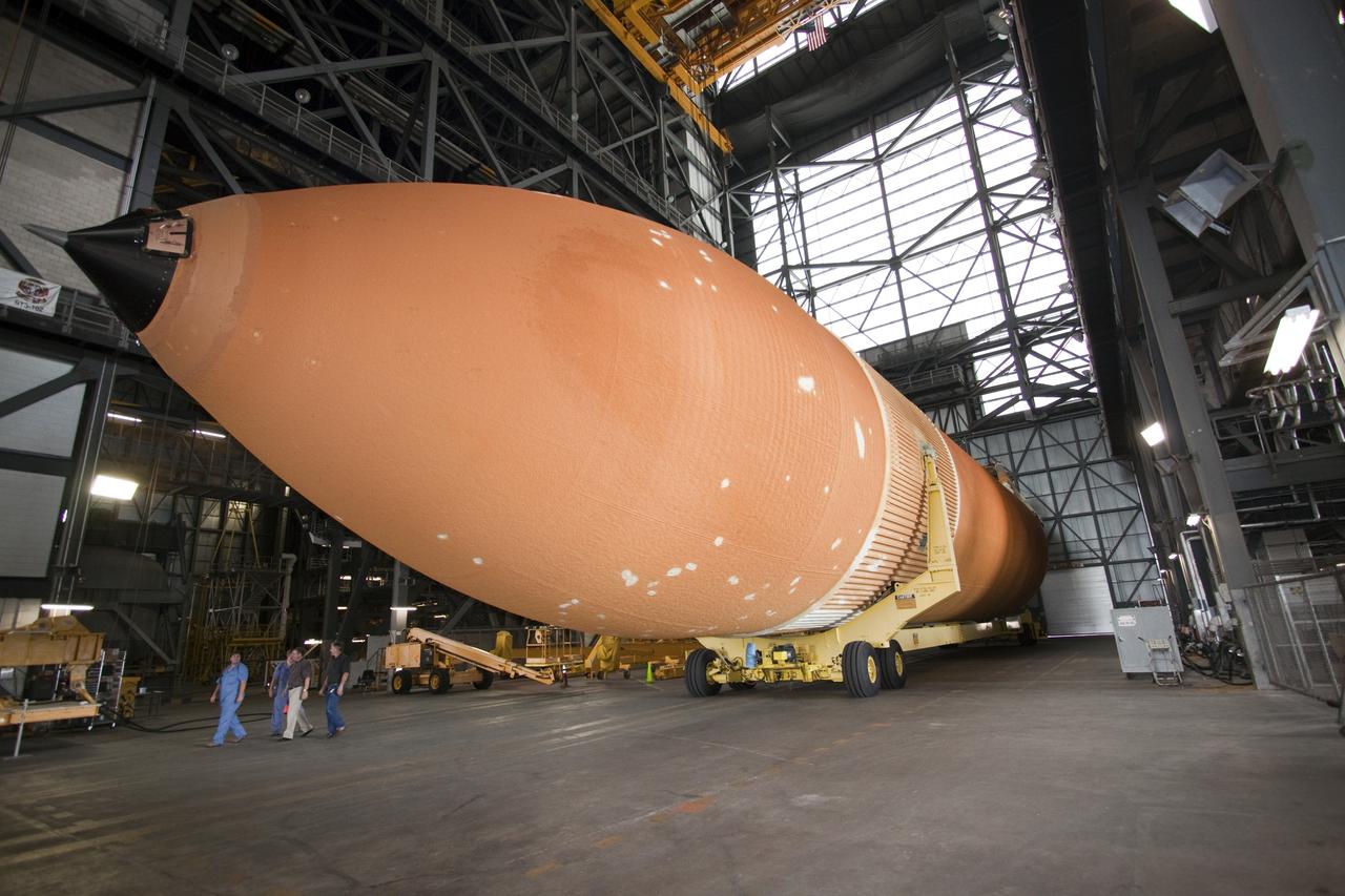 CAPE CANAVERAL, Fla. -- To commemorate the history of the Space Shuttle Program's last external fuel tank, its intertank door is emblazoned with an ET-122 insignia. The tank is in the Vehicle Assembly Building at NASA's Kennedy Space Center in Florida after traveling 900 miles by sea from NASA's Michoud Assembly Facility in New Orleans aboard the Pegasus Barge. It eventually will be attached to space shuttle Endeavour for the STS-134 mission to the International Space Station. STS-134, targeted to launch in Feb. 2011, currently is scheduled to be the last mission in the shuttle program.           The tank, which is the largest element of the space shuttle stack, was completed in 2002, modified during Return to Flight operations in 2003 and 2004, damaged during Hurricane Katrina in 2005, and then restored to flight configuration by Lockheed Martin Space Systems Company employees in 2008 at NASA's Marshall Space Flight Center in Alabama. Photo credit: NASA/Jack Pfaller
