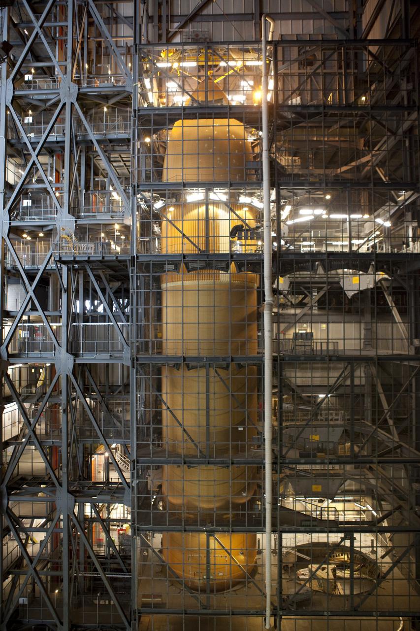 CAPE CANAVERAL, Fla. -- In the Vehicle Assembly Building at NASA's Kennedy Space Center in Florida, External Fuel Tank-122 is being lowered onto a test stand where it will be checked out before launch.        ET-122, the Space Shuttle Program's last external fuel tank was delivered to Kennedy's Turn Basin from NASA’s Michoud Assembly Facility in New Orleans aboard the Pegasus Barge. After testing ET-122 eventually will be attached to space shuttle Endeavour for the STS-134 mission to the International Space Station targeted to launch February, 2011. For more information visit: http://www.nasa.gov/mission_pages/shuttle/shuttlemissions/sts134/index.html. Photo credit: NASA/Dimitri Gerondidakis