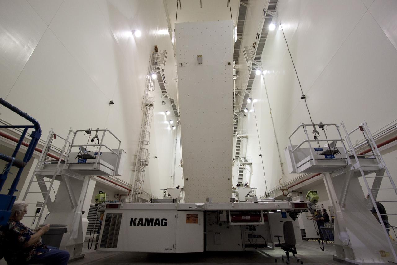 CAPE CANAVERAL, Fla. -- In the Canister Rotation Facility at NASA's Kennedy Space Center in Florida, an overhead crane lifts the payload canister into a vertical position.        The canister will then be delivered to Launch Pad 39A, lifted into the rotating service structure where the module will be moved into the clean room before it is installed into space shuttle Discovery's payload bay. Discovery and its STS-133 crew will deliver the PMM, packed with supplies and critical spare parts, as well as Robonaut 2, the dexterous humanoid astronaut helper, to the International Space Station. Launch is targeted for 4:40 p.m. EDT, Nov. 1. Photo credit: NASA/Jack Pfaller