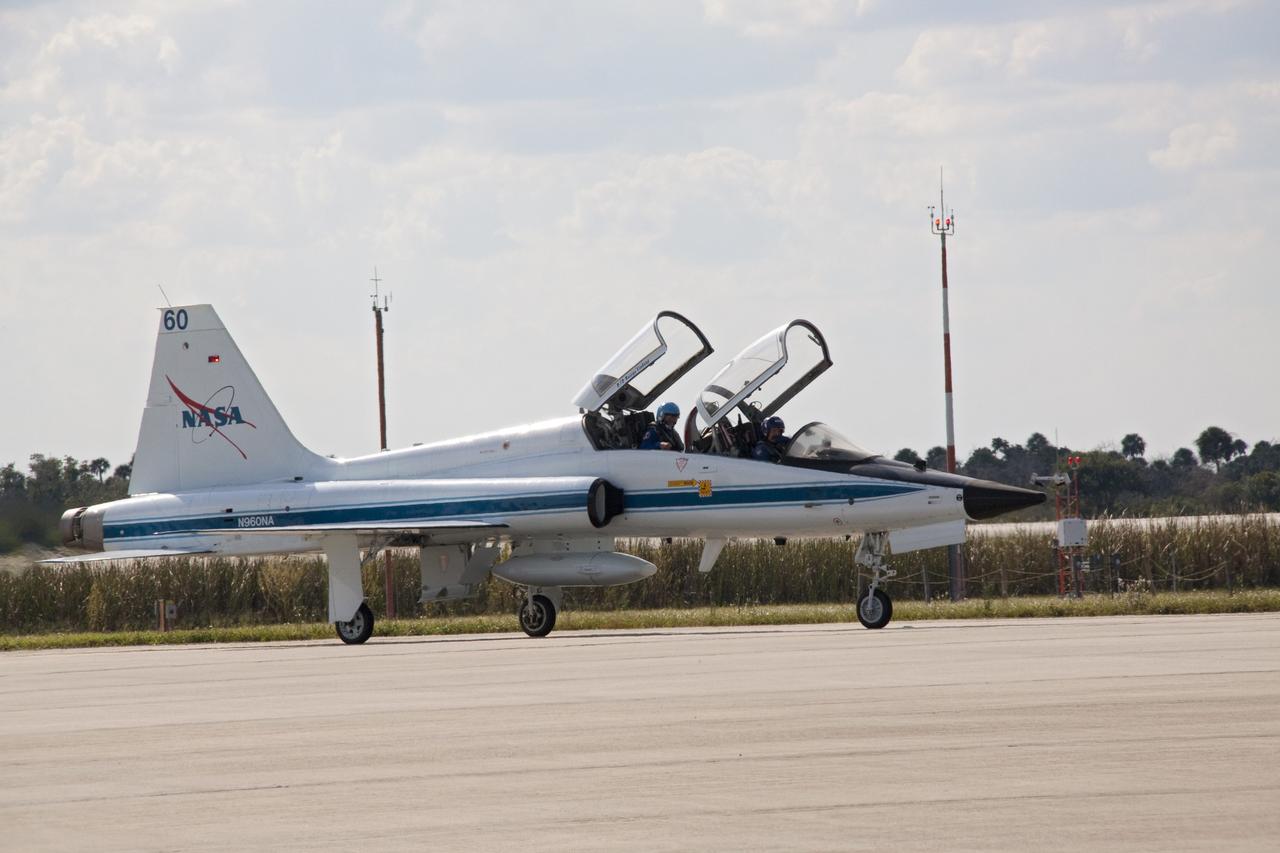 CAPE CANAVERAL, Fla. -- STS-133 crew members begin to arrive at the Shuttle Landing Facility at NASA's Kennedy Space Center in Florida in T-38 training jet. The crew is at Kennedy for a practice launch dress rehearsal called the Terminal Countdown Demonstration Test (TCDT) in preparation for their upcoming mission.   TCDT provides each shuttle crew and launch team with an opportunity to participate in various simulated countdown activities, including equipment familiarization and emergency training. Space shuttle Discovery and its STS-133 crew will deliver the Permanent Multipurpose Module, packed with supplies and critical spare parts, as well as Robonaut 2, the dexterous humanoid astronaut helper, to the International Space Station. Launch is targeted for Nov. 1 at 4:40 p.m. For more information on the STS-133 mission, visit www.nasa.gov/shuttle. Photo credit: NASA/Jack Pfaller