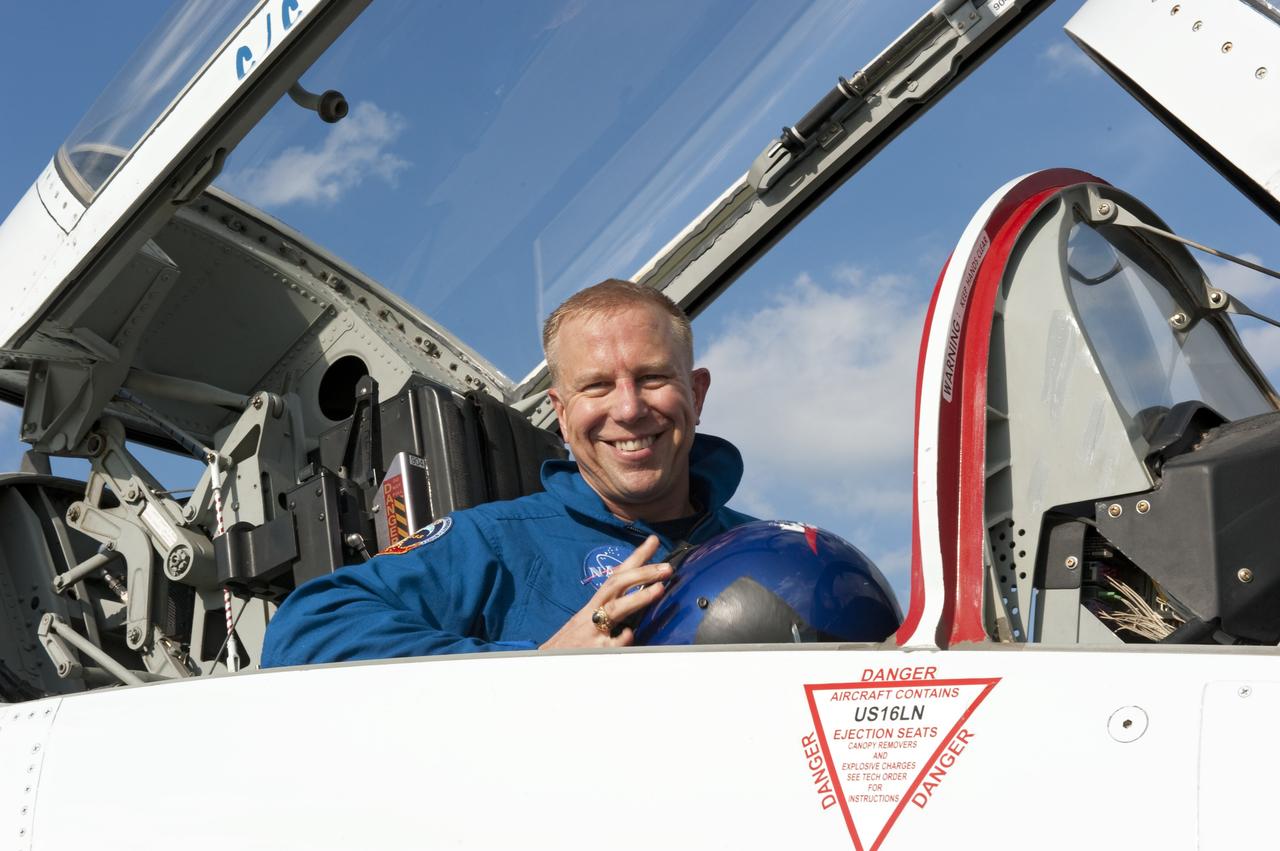 CAPE CANAVERAL, Fla. -- STS-133 Mission Specialist Tim Kopra arrives in a T-38 jet to the Shuttle Landing Facility at NASA's Kennedy Space Center in Florida. The STS-133 crew members are at Kennedy for a practice launch dress rehearsal called the Terminal Countdown Demonstration Test (TCDT) in preparation for their upcoming mission.         TCDT provides each shuttle crew and launch team with an opportunity to participate in various simulated countdown activities, including equipment familiarization and emergency training. Space shuttle Discovery and its STS-133 crew will deliver the Permanent Multipurpose Module, packed with supplies and critical spare parts, as well as Robonaut 2, the dexterous humanoid astronaut helper, to the International Space Station. Launch is targeted for Nov. 1 at 4:40 p.m. For more information on the STS-133 mission, visit www.nasa.gov/shuttle. Photo credit: NASA/Kim Shiflett