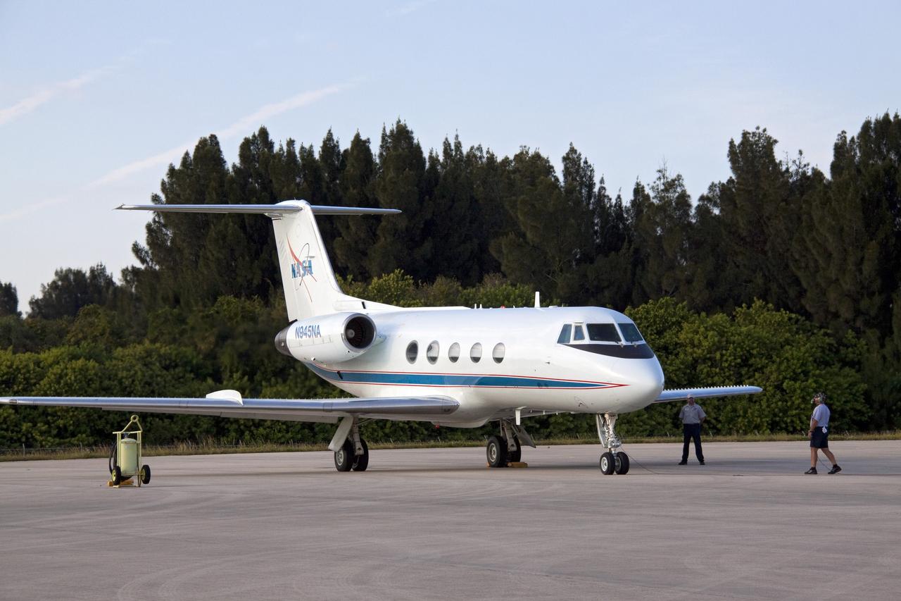 CAPE CANAVERAL, Fla. -- A Shuttle Training Aircraft (STA) is ready for flight on the Shuttle Landing Facility runway at NASA's Kennedy Space Center in Florida. STS-133 Commander Steve Lindsey and Pilot Eric Boe will fly the modified Gulfstream II business jets to mimic the shuttle's handling during the final phase of landing. Practice landings are part of the Terminal Countdown Demonstration Test (TCDT), which provides each shuttle crew and launch team an opportunity to participate in various simulated activities, including equipment familiarization and emergency training at the launch pad.    Space shuttle Discovery and its STS-133 crew will deliver the Permanent Multipurpose Module, packed with supplies and critical spare parts, as well as Robonaut 2, the dexterous humanoid astronaut helper, to the International Space Station. Launch is targeted for Nov. 1 at 4:40 p.m. For more information on the STS-133 mission, visit www.nasa.gov/mission_pages/shuttle/shuttlemissions/sts133/. Photo credit: NASA/Jack Pfaller