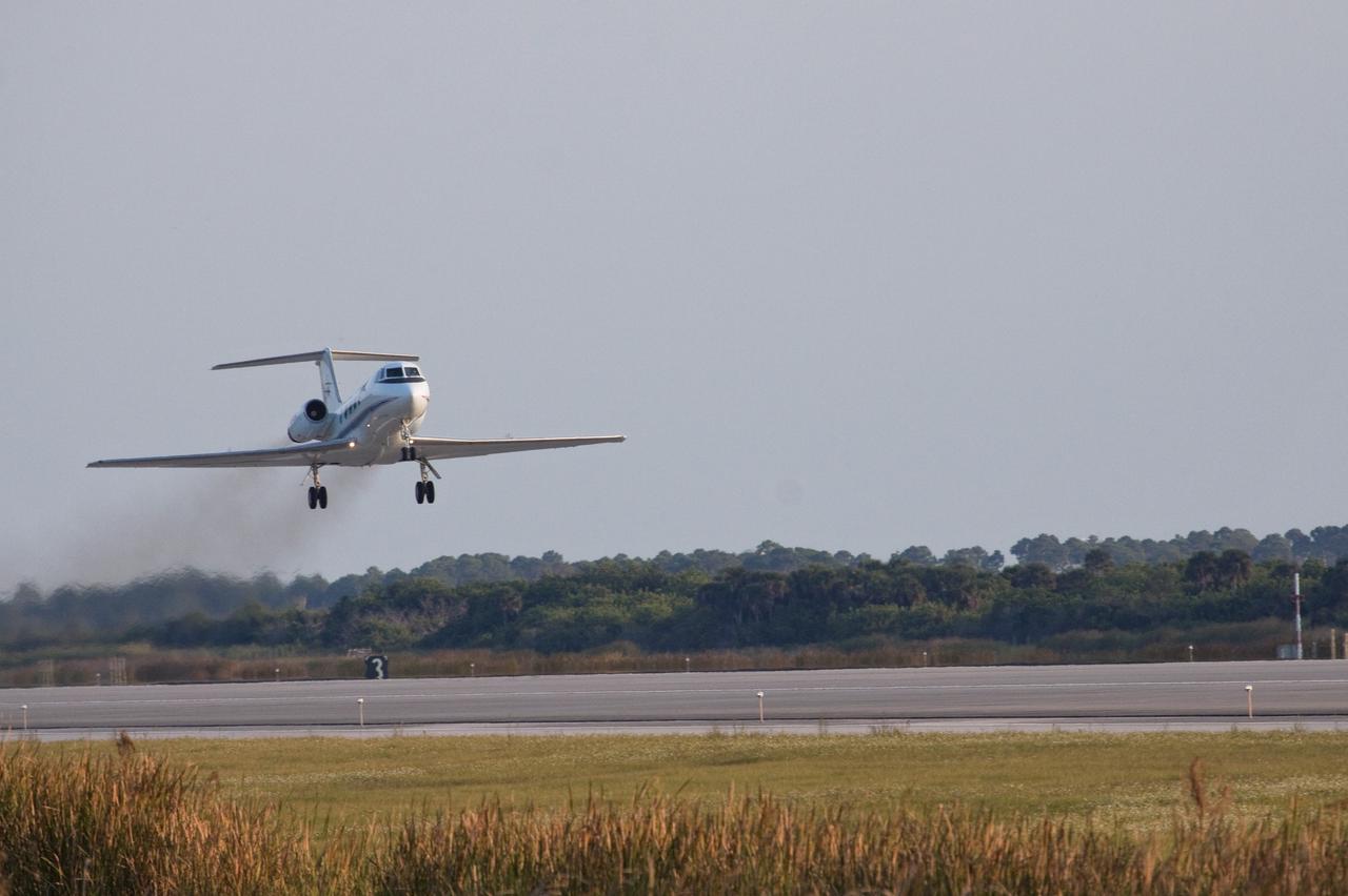 CAPE CANAVERAL, Fla. -- A Shuttle Training Aircraft (STA) performs touch-and-go landings on the Shuttle Landing Facility runway at NASA's Kennedy Space Center in Florida. STS-133 Commander Steve Lindsey and Pilot Eric Boe are flying the modified Gulfstream II business jets to mimic the shuttle's handling during the final phase of landing. Practice landings are part of the Terminal Countdown Demonstration Test (TCDT), which provides each shuttle crew and launch team an opportunity to participate in various simulated activities, including equipment familiarization and emergency training at the launch pad.    Space shuttle Discovery and its STS-133 crew will deliver the Permanent Multipurpose Module, packed with supplies and critical spare parts, as well as Robonaut 2, the dexterous humanoid astronaut helper, to the International Space Station. Launch is targeted for Nov. 1 at 4:40 p.m. For more information on the STS-133 mission, visit www.nasa.gov/mission_pages/shuttle/shuttlemissions/sts133/. Photo credit: NASA/Jack Pfaller