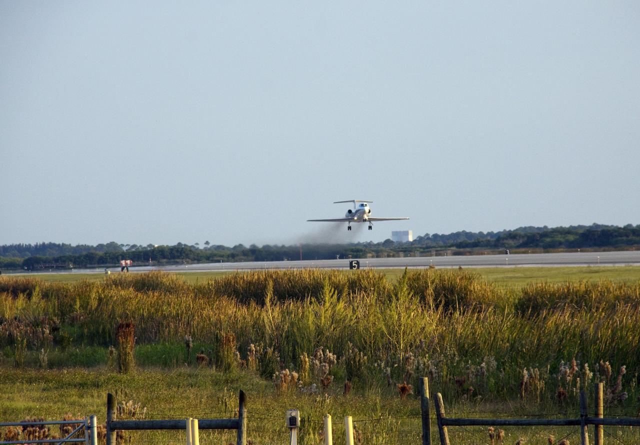 CAPE CANAVERAL, Fla. -- A Shuttle Training Aircraft (STA) performs touch-and-go landings on the Shuttle Landing Facility runway at NASA's Kennedy Space Center in Florida. STS-133 Commander Steve Lindsey and Pilot Eric Boe are flying the modified Gulfstream II business jets to mimic the shuttle's handling during the final phase of landing. Practice landings are part of the Terminal Countdown Demonstration Test (TCDT), which provides each shuttle crew and launch team an opportunity to participate in various simulated activities, including equipment familiarization and emergency training at the launch pad. Space shuttle Discovery and its STS-133 crew will deliver the Permanent Multipurpose Module, packed with supplies and critical spare parts, as well as Robonaut 2, the dexterous humanoid astronaut helper, to the International Space Station. Launch is targeted for Nov. 1 at 4:40 p.m. For more information on the STS-133 mission, visit www.nasa.gov/mission_pages/shuttle/shuttlemissions/sts133/. Photo credit: NASA/Jack Pfaller