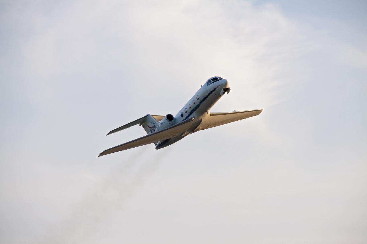 CAPE CANAVERAL, Fla. -- A Shuttle Training Aircraft (STA) performs touch-and-go landings over the Shuttle Landing Facility runway at NASA's Kennedy Space Center in Florida. STS-133 Commander Steve Lindsey and Pilot Eric Boe are flying the modified Gulfstream II business jet to mimic the shuttle's handling during the final phase of landing. Practice landings are part of the Terminal Countdown Demonstration Test (TCDT), which provides each shuttle crew and launch team an opportunity to participate in various simulated activities, including equipment familiarization and emergency training at the launch pad.    Space shuttle Discovery and its STS-133 crew will deliver the Permanent Multipurpose Module, packed with supplies and critical spare parts, as well as Robonaut 2, the dexterous humanoid astronaut helper, to the International Space Station. Launch is targeted for Nov. 1 at 4:40 p.m. For more information on the STS-133 mission, visit www.nasa.gov/mission_pages/shuttle/shuttlemissions/sts133/. Photo credit: NASA/Jack Pfaller