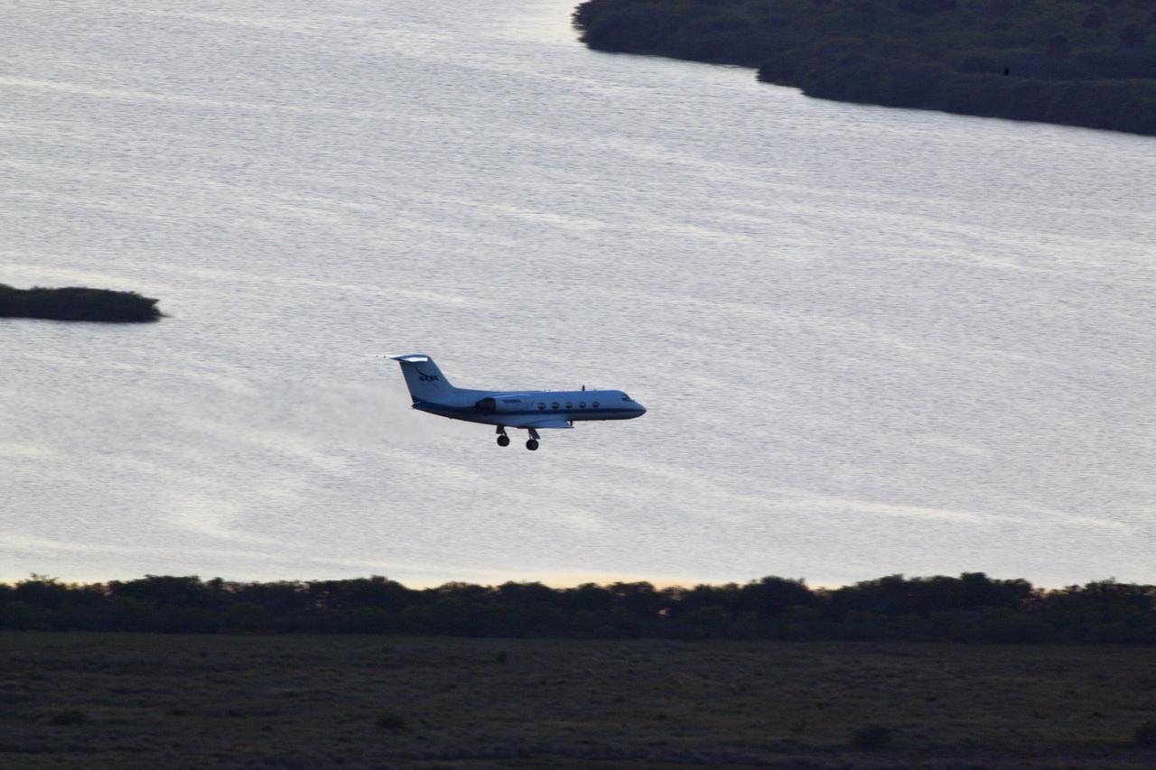 CAPE CANAVERAL, Fla. -- A Shuttle Training Aircraft (STA) performs touch-and-go landings over the Shuttle Landing Facility runway at NASA's Kennedy Space Center in Florida. STS-133 Commander Steve Lindsey and Pilot Eric Boe are flying two Gulfstream II business jets that are modified to mimic the shuttle's handling during the final phase of landing. Practice landings are part of the Terminal Countdown Demonstration Test (TCDT), which provides each shuttle crew and launch team an opportunity to participate in various simulated activities, including equipment familiarization and emergency training at the launch pad.        Space shuttle Discovery and its STS-133 crew will deliver the Permanent Multipurpose Module, packed with supplies and critical spare parts, as well as Robonaut 2, the dexterous humanoid astronaut helper, to the International Space Station. Launch is targeted for Nov. 1 at 4:40 p.m. For more information on the STS-133 mission, visit www.nasa.gov/mission_pages/shuttle/shuttlemissions/sts133/. Photo credit: NASA/Dimitri Gerondidakis