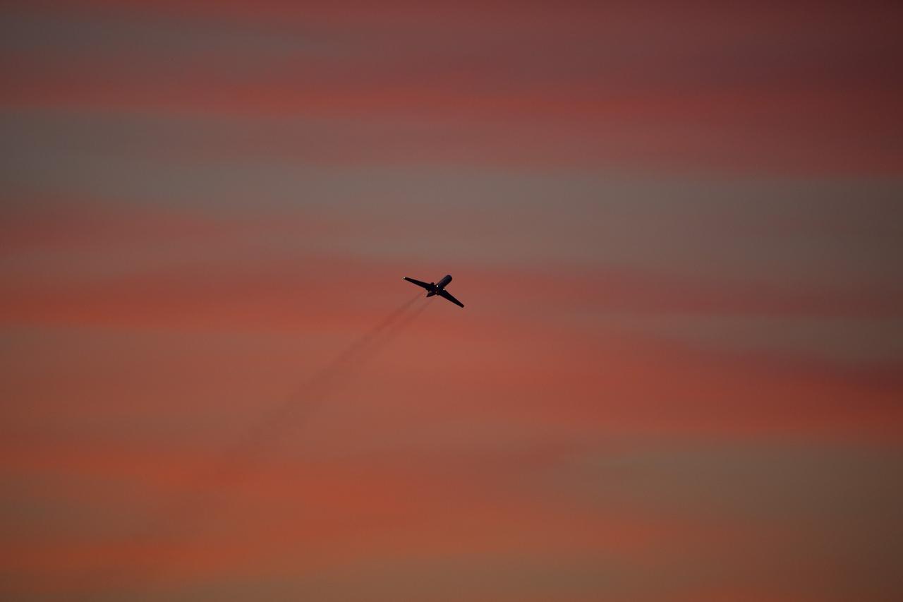 CAPE CANAVERAL, Fla. -- A Shuttle Training Aircraft (STA) performs touch-and-go landings as the sun sets over the Shuttle Landing Facility runway at NASA's Kennedy Space Center in Florida. STS-133 Commander Steve Lindsey and Pilot Eric Boe are flying two Gulfstream II business jets that are modified to mimic the shuttle's handling during the final phase of landing. Practice landings are part of the Terminal Countdown Demonstration Test (TCDT), which provides each shuttle crew and launch team an opportunity to participate in various simulated activities, including equipment familiarization and emergency training at the launch pad.        Space shuttle Discovery and its STS-133 crew will deliver the Permanent Multipurpose Module, packed with supplies and critical spare parts, as well as Robonaut 2, the dexterous humanoid astronaut helper, to the International Space Station. Launch is targeted for Nov. 1 at 4:40 p.m. For more information on the STS-133 mission, visit www.nasa.gov/mission_pages/shuttle/shuttlemissions/sts133/. Photo credit: NASA/Dimitri Gerondidakis