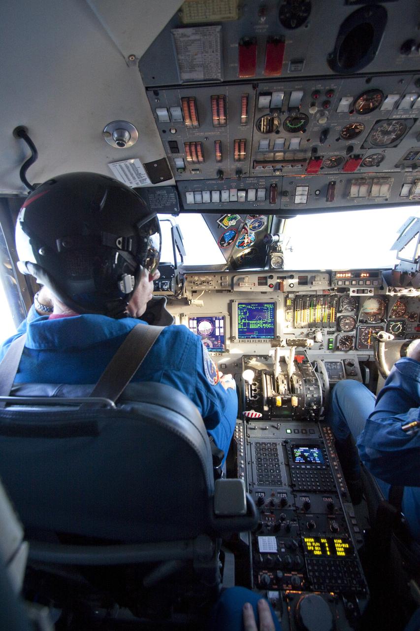 CAPE CANAVERAL, Fla. -- STS-133 Commander Steve Lindsey straps in and prepares to fly touch-and-go landings in a Shuttle Training Aircraft (STA) on the Shuttle Landing Facility runway at NASA's Kennedy Space Center in Florida. Lindsey and STS-133 Pilot Eric Boe will fly two of the Gulfstream II business jets that are modified to mimic the shuttle's handling during the final phase of landing. Practice landings are part of the Terminal Countdown Demonstration Test (TCDT), which provides each shuttle crew and launch team an opportunity to participate in various simulated activities, including equipment familiarization and emergency training at the launch pad.      Space shuttle Discovery and its STS-133 crew will deliver the Permanent Multipurpose Module, packed with supplies and critical spare parts, as well as Robonaut 2, the dexterous humanoid astronaut helper, to the International Space Station. Launch is targeted for Nov. 1 at 4:40 p.m. For more information on the STS-133 mission, visit www.nasa.gov/mission_pages/shuttle/shuttlemissions/sts133/. Photo credit: NASA/Jack Pfaller