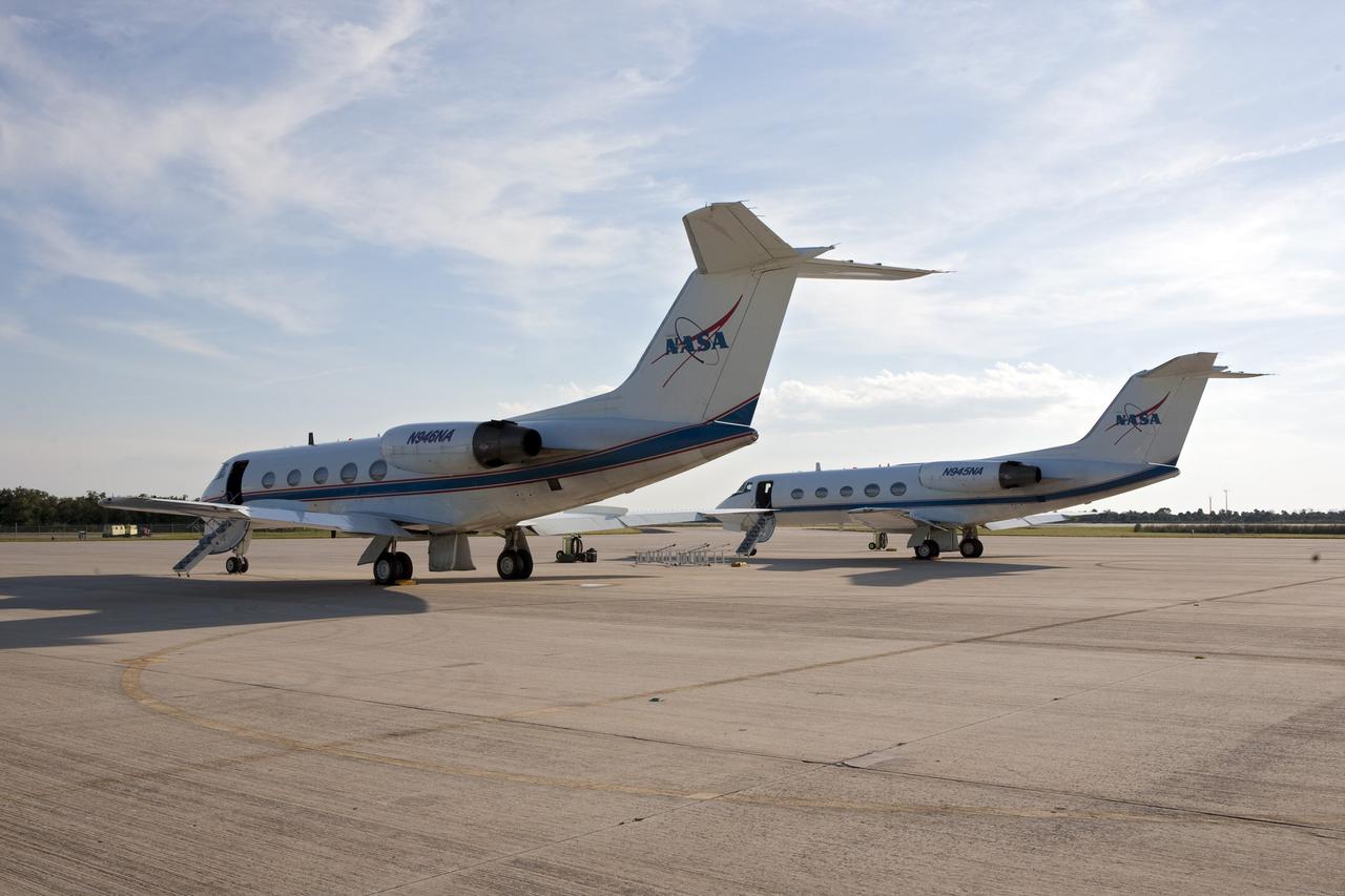 CAPE CANAVERAL, Fla. -- Two Shuttle Training Aircraft (STA) are ready for flight on the Shuttle Landing Facility runway at NASA's Kennedy Space Center in Florida. STS-133 Commander Steve Lindsey and Pilot Eric Boe will fly the two Gulfstream II business jets that are modified to mimic the shuttle's handling during the final phase of landing. Practice landings are part of the Terminal Countdown Demonstration Test (TCDT), which provides each shuttle crew and launch team an opportunity to participate in various simulated activities, including equipment familiarization and emergency training at the launch pad.    Space shuttle Discovery and its STS-133 crew will deliver the Permanent Multipurpose Module, packed with supplies and critical spare parts, as well as Robonaut 2, the dexterous humanoid astronaut helper, to the International Space Station. Launch is targeted for Nov. 1 at 4:40 p.m. For more information on the STS-133 mission, visit www.nasa.gov/mission_pages/shuttle/shuttlemissions/sts133/. Photo credit: NASA/Amanda Diller