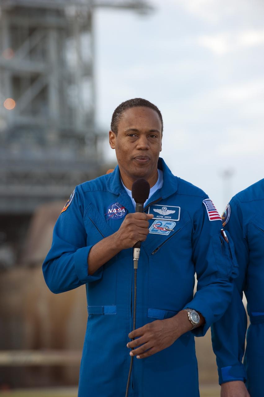 CAPE CANAVERAL, Fla. -- At NASA's Kennedy Space Center in Florida, STS-133 Mission Specialist Alvin Drew talks to media at Launch Pad 39A, where space shuttle Discovery is poised for launch next month. The six-member STS-133 crew is at Kennedy for the Terminal Countdown Demonstration Test (TCDT), which provides each shuttle crew and launch team an opportunity to participate in various simulated activities, including equipment familiarization and emergency training at the launch pad. Discovery and its crew will deliver the Permanent Multipurpose Module, packed with supplies and critical spare parts, as well as Robonaut 2, the dexterous humanoid astronaut helper, to the International Space Station. Launch is targeted for Nov. 1 at 4:40 p.m. For more information on the STS-133 mission, visit www.nasa.gov/mission_pages/shuttle/shuttlemissions/sts133/. Photo credit: NASA/Kim Shiflett