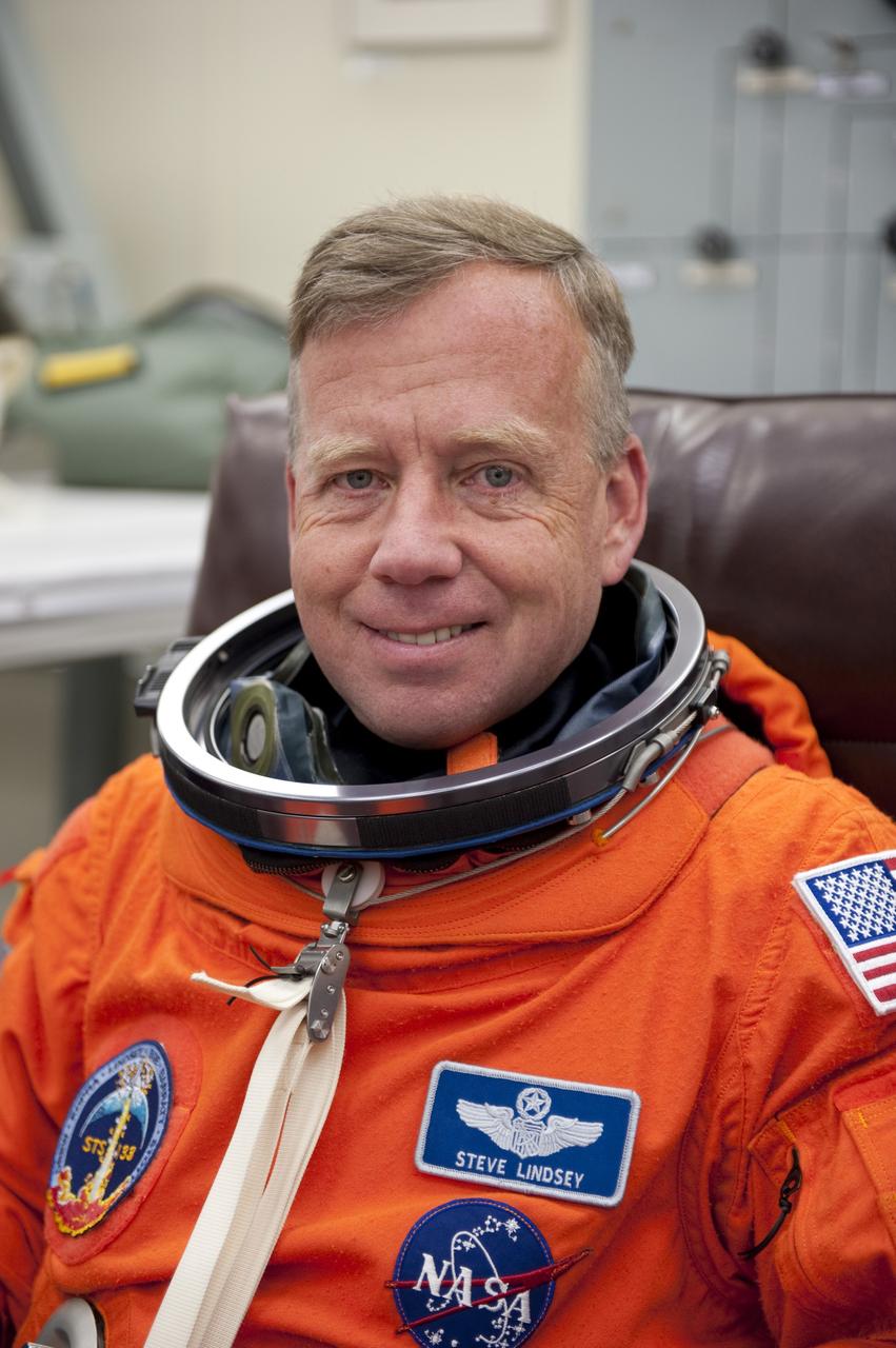 CAPE CANAVERAL, Fla. -- STS-133 Commander Steve Lindsey is suited up in the Operations and Checkout Building at NASA's Kennedy Space Center in Florida during a simulated launch countdown. Checking the fit of their orange launch-and-entry suits and helmets before launch day is part of the Terminal Countdown Demonstration Test (TCDT), which provides each shuttle crew and launch team an opportunity to participate in various simulated activities, including equipment familiarization and emergency training at the launch pad. Space shuttle Discovery and its STS-133 crew will deliver the Permanent Multipurpose Module, packed with supplies and critical spare parts, as well as Robonaut 2, the dexterous humanoid astronaut helper, to the International Space Station. Launch is targeted for Nov. 1 at 4:40 p.m. For more information on the STS-133 mission, visit www.nasa.gov/mission_pages/shuttle/shuttlemissions/sts133/. Photo credit: NASA/Kim Shiflett