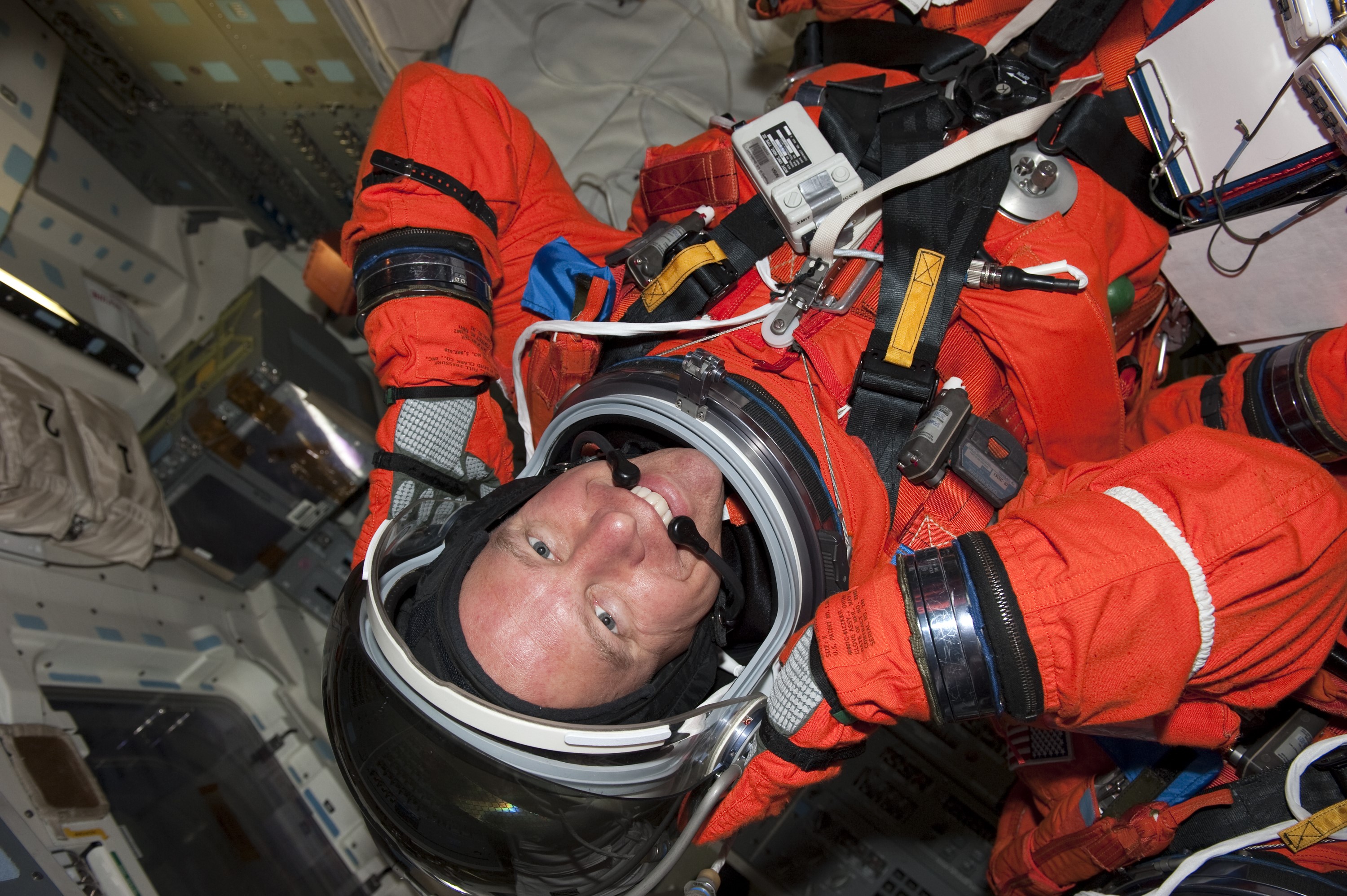 CAPE CANAVERAL, Fla. -- During a simulated launch countdown on Launch Pad 39A at NASA's Kennedy Space Center in Florida, STS-133 Mission Specialist Tim Kopra is strapped into his seat on space shuttle Discovery. Next, the crew members will practice escaping the shuttle, in preparation for an unlikely emergency at the pad on launch day. The simulated launch countdown and emergency exit training are part of a week-long Terminal Countdown Demonstration Test (TCDT). Discovery and its STS-133 crew will deliver the Permanent Multipurpose Module, packed with supplies and critical spare parts, as well as Robonaut 2, the dexterous humanoid astronaut helper, to the International Space Station. Launch is targeted for Nov. 1 at 4:40 p.m. For more information on the STS-133 mission, visit www.nasa.gov/mission_pages/shuttle/shuttlemissions/sts133/. Photo credit: NASA/Kim Shiflett