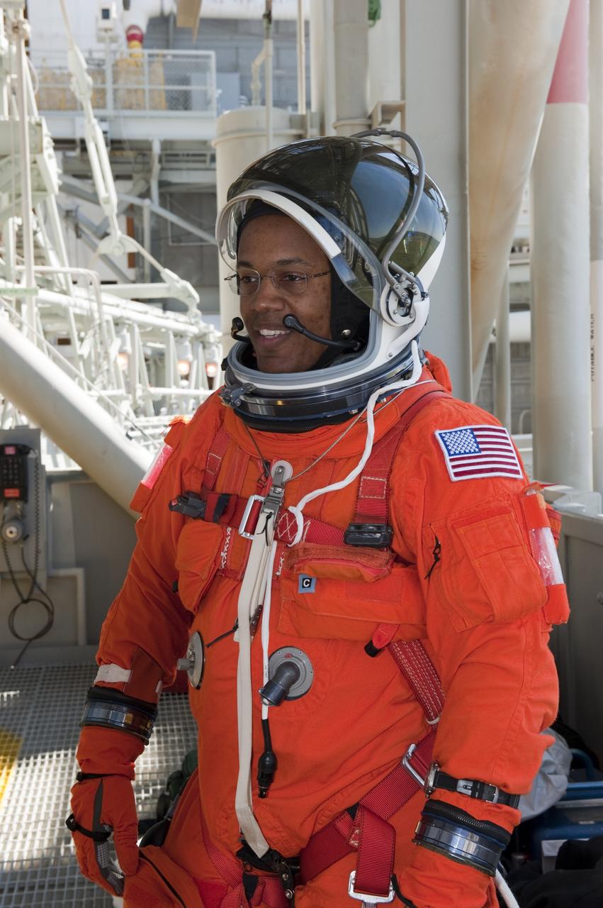 CAPE CANAVERAL, Fla. -- Following a simulated pad emergency, STS-133 Mission Specialist Alvin Drew stands on the 195-foot level on Launch Pad 39A at NASA's Kennedy Space Center in Florida. The emergency exit training from space shuttle Discovery is part of a week-long Terminal Countdown Demonstration Test (TCDT). Discovery and its STS-133 crew will deliver the Permanent Multipurpose Module, packed with supplies and critical spare parts, as well as Robonaut 2, the dexterous humanoid astronaut helper, to the International Space Station. Launch is targeted for Nov. 1 at 4:40 p.m. For more information on the STS-133 mission, visit www.nasa.gov/mission_pages/shuttle/shuttlemissions/sts133/. Photo credit: NASA/Kim Shiflett