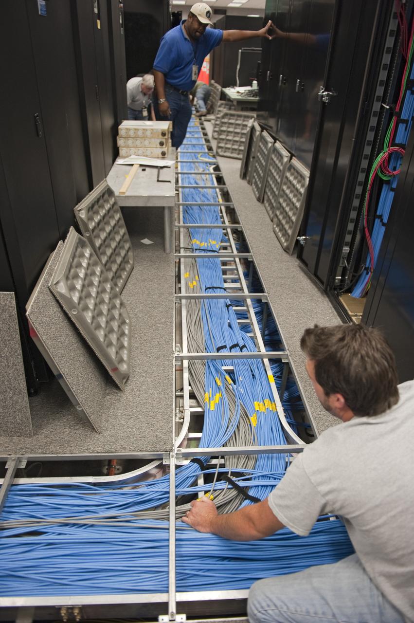 CAPE CANAVERAL, Fla. -- At NASA's Kennedy Space Center in Florida, rewiring and remodeling for launches of future human spaceflight vehicles take place in the Launch Control Center's Young-Crippen Firing Room. Known as Firing Room 1 in the Apollo era, it was re-named as a tribute to the Space Shuttle Program's first crewed mission, STS-1, which was flown by Commander John Young and Pilot Robert Crippen in April 1981. The firing room most recently was set up to support the Ares I-X flight test in Oct. 2009.   Photo credit: NASA/Kim Shiflett