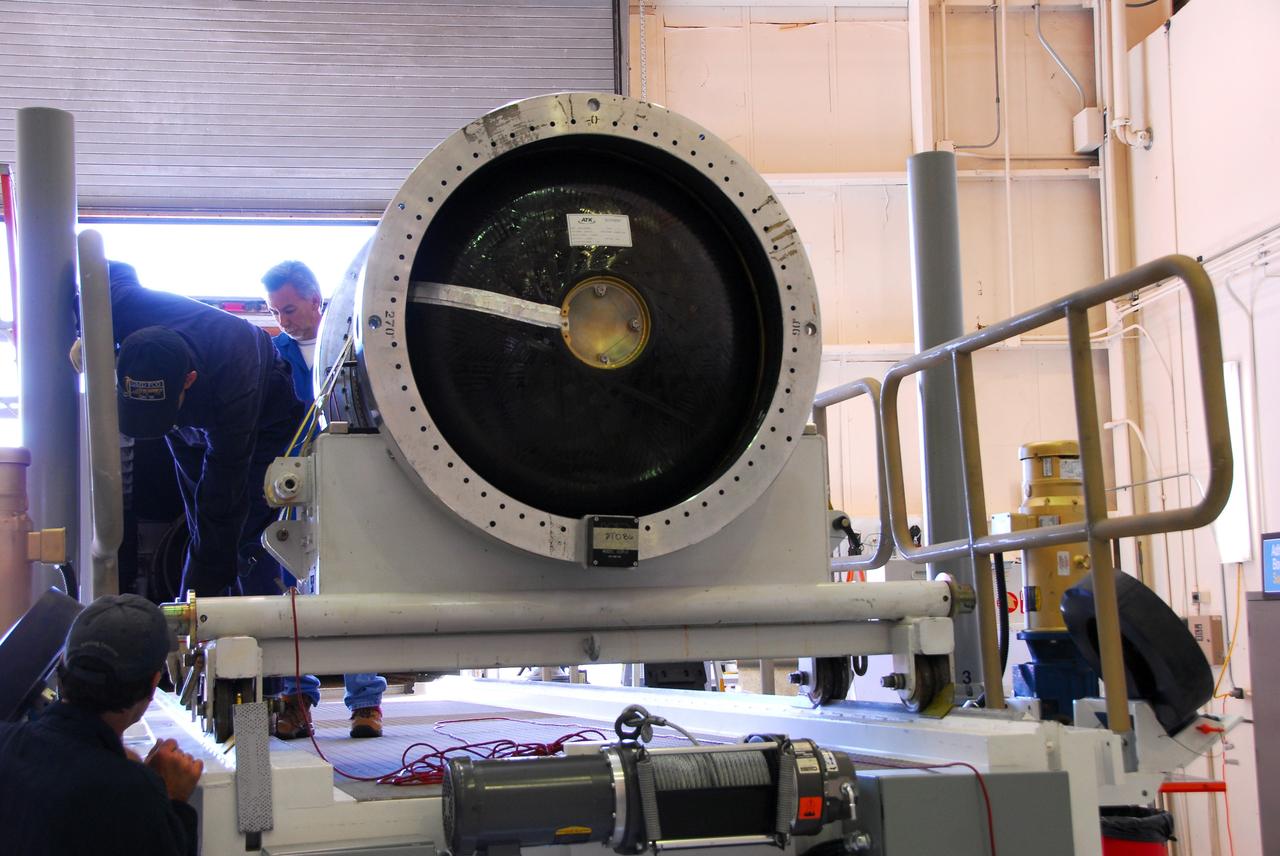 VANDENBERG AIR FORCE BASE, Calif. -- At Vandenberg Air Force Base in California, the third stage of the Pegasus XL rocket that will launch the Nuclear Spectroscopic Telescope Array (NuSTAR) to orbit is moved onto a jackable rail for processing in Building 1555. After the rocket and spacecraft are processed at Vandenberg, they will be shipped to the Ronald Reagan Ballistic Missile Defense Test Site located at the Pacific Ocean’s Kwajalein Atoll for launch.      The high-energy X-ray telescope will conduct a census for black holes, map radioactive material in young supernovae remnants, and study the origins of cosmic rays and the extreme physics around collapsed stars. Photo credit: NASA/Dan Liberotti, VAFB