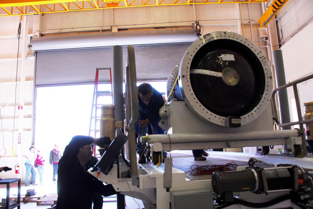 VANDENBERG AIR FORCE BASE, Calif. -- At Vandenberg Air Force Base in California, the third stage of the Pegasus XL rocket that will launch the Nuclear Spectroscopic Telescope Array (NuSTAR) to orbit is moved onto a jackable rail for processing in Building 1555. After the rocket and spacecraft are processed at Vandenberg, they will be shipped to the Ronald Reagan Ballistic Missile Defense Test Site located at the Pacific Ocean’s Kwajalein Atoll for launch.    The high-energy X-ray telescope will conduct a census for black holes, map radioactive material in young supernovae remnants, and study the origins of cosmic rays and the extreme physics around collapsed stars. Photo credit: NASA/Dan Liberotti, VAFB