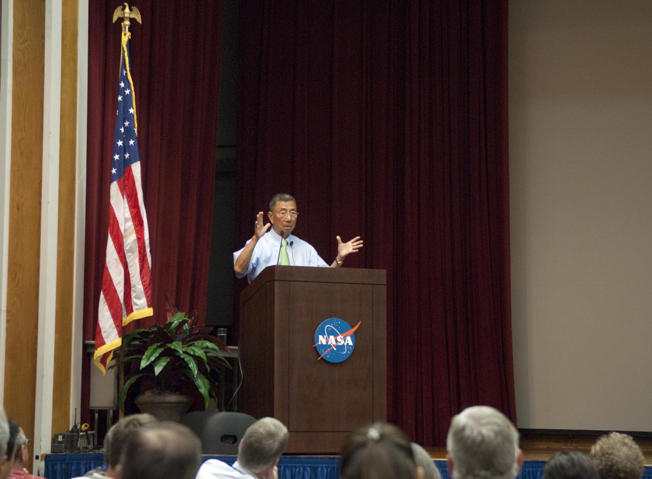CAPE CANAVERAL, Fla. -- In the Training Auditorium at NASA's Kennedy Space Center in Florida, Professor Sam Ting talks to employees about the Alpha Magnetic Spectrometer-2 (AMS). Ting is the particle physics detector's principal investigator at the Massachusetts Institute of Technology.      AMS is designed to operate as an external module on the International Space Station. It will use the unique environment of space to study the universe and its origin by searching for dark matter. AMS-2 will fly to the station aboard space shuttle Endeavour's STS-134 mission targeted to launch Feb. 27, 2011. Photo credit: NASA/Jim Grossmann