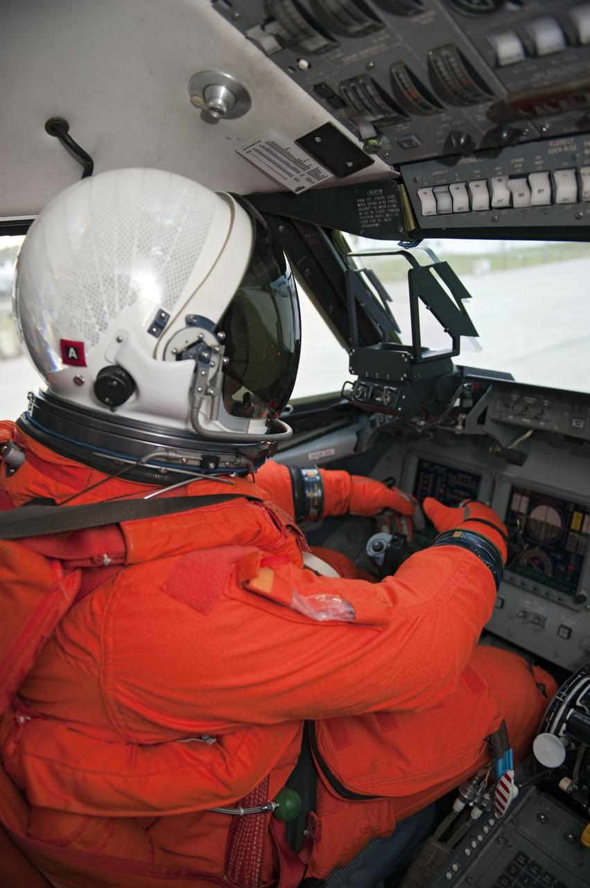 CANAVERAL, Fla. -- At NASA's Kennedy Space Center in Florida, STS-133 Commander Steve Lindsey is ready to fly touch-and-go landings in a Shuttle Training Aircraft (STA) over the Shuttle Landing Facility runway. The Gulfstream II business jet is modified to mimic the shuttle's handling during the final phase of landing.       Space shuttle Discovery's crew members are at Kennedy for their upcoming launch to the International Space Station. In the days leading up to lift off, they will check the fit of their spacesuits, review launch-day procedures, receive weather briefings and remain medically quarantined to prevent sickness. STS-133 will deliver the Permanent Multipurpose Module, packed with supplies and critical spare parts, as well as Robonaut 2, the dexterous humanoid astronaut helper, to the orbiting outpost. For more information on the STS-133 mission, visit www.nasa.gov/mission_pages/shuttle/shuttlemissions/sts133/. Photo credit: NASA/Kim Shiflett