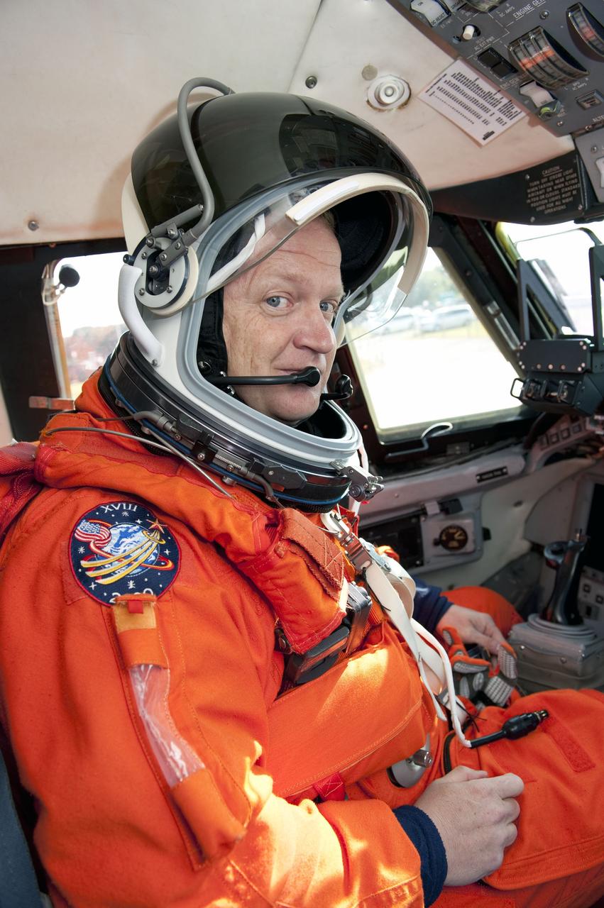 CANAVERAL, Fla. -- At NASA's Kennedy Space Center in Florida, STS-133 Pilot Eric Boe returns from flying touch-and-go landings in a Shuttle Training Aircraft (STA) over the Shuttle Landing Facility runway. The Gulfstream II business jet is modified to mimic the shuttle's handling during the final phase of landing.           Space shuttle Discovery's crew members are at Kennedy for their upcoming launch to the International Space Station. In the days leading up to lift off, they will check the fit of their spacesuits, review launch-day procedures, receive weather briefings and remain medically quarantined to prevent sickness. STS-133 will deliver the Permanent Multipurpose Module, packed with supplies and critical spare parts, as well as Robonaut 2, the dexterous humanoid astronaut helper, to the orbiting outpost. For more information on the STS-133 mission, visit www.nasa.gov/mission_pages/shuttle/shuttlemissions/sts133/. Photo credit: NASA/Kim Shiflett