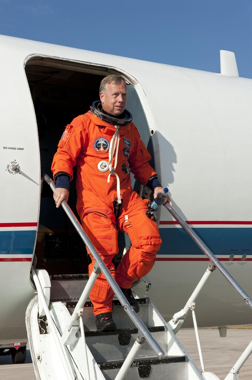 CANAVERAL, Fla. -- At NASA's Kennedy Space Center in Florida, STS-133 Commander Steve Lindsey returns from flying touch-and-go landings in a Shuttle Training Aircraft (STA) over the Shuttle Landing Facility runway. The Gulfstream II business jet is modified to mimic the shuttle's handling during the final phase of landing.         Space shuttle Discovery's crew members are at Kennedy for their upcoming launch to the International Space Station. In the days leading up to lift off, they will check the fit of their spacesuits, review launch-day procedures, receive weather briefings and remain medically quarantined to prevent sickness. STS-133 will deliver the Permanent Multipurpose Module, packed with supplies and critical spare parts, as well as Robonaut 2, the dexterous humanoid astronaut helper, to the orbiting outpost. For more information on the STS-133 mission, visit www.nasa.gov/mission_pages/shuttle/shuttlemissions/sts133/. Photo credit: NASA/Kim Shiflett