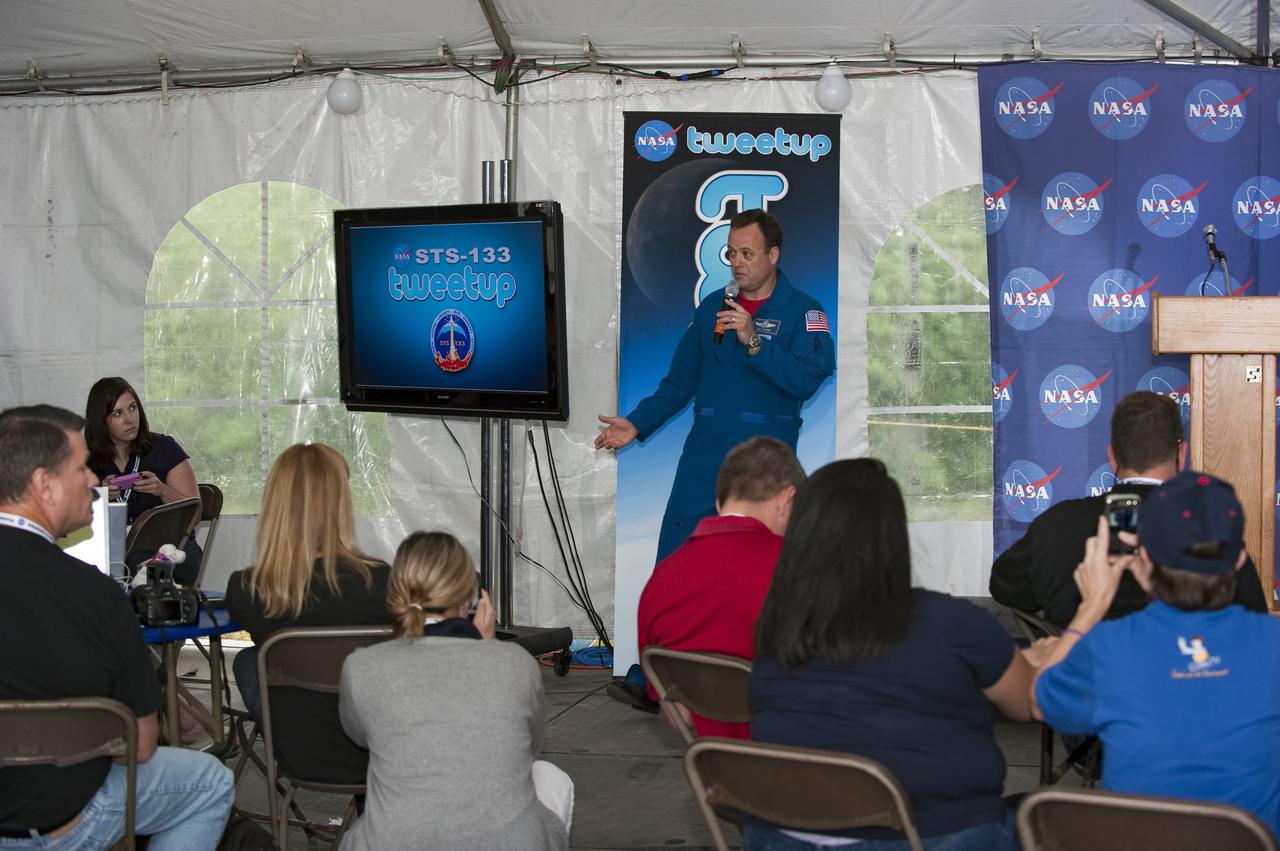 CAPE CANAVERAL, Fla. -- At NASA's Kennedy Space Center in Florida, NASA astronaut Ron Garan addresses participants of the STS-133 Tweetup. NASA is hosting about 150 of its Twitter followers from around the world and several dozen states and providing them with a behind-the-scenes perspective to share with their own followers on the social networking service.      The "Tweeps," as NASA calls them, will have a chance to tour Kennedy and meet with shuttle technicians, managers, engineers and astronauts. They also will receive a demonstration of Robonaut, a human-like robot similar to the one that will be delivered to the International Space Station on the STS-133 mission. Space shuttle Discovery and its STS-133 crew are scheduled to launch Nov. 3 at 3:52 p.m. EDT. For more information on the upcoming mission, visit www.nasa.gov/mission_pages/shuttle/shuttlemissions/sts133/. Photo credit: NASA/Kim Shiflett
