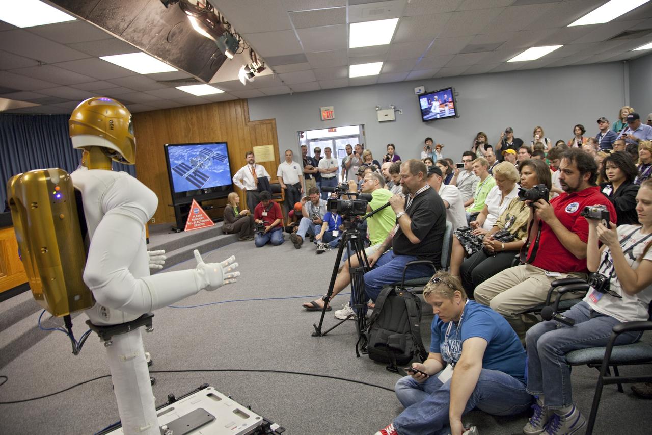 CAPE CANAVERAL, Fla. -- At NASA's Kennedy Space Center in Florida, a dexterous humanoid astronaut helper, known as Robonaut, is on display for participants of the STS-133 Tweetup. Robonaut 2 (R2) will be delivered to the International Space Station on space shuttle Discovery's STS-133 mission. Although R2 will initially only participate in operational tests, upgrades could eventually allow the robot to realize its true purpose -- helping spacewalking astronauts with tasks outside the orbiting laboratory. NASA is hosting about 150 of its Twitter followers from around the world and several dozen states and providing them with a behind-the-scenes perspective to share with their own followers on the social networking service. The "Tweeps," as NASA calls them, will have a chance to tour Kennedy, meet with shuttle technicians, managers, engineers and astronauts, and witness Discovery's launch. Discovery and its STS-133 crew are scheduled to lift off Nov. 3 at 3:52 p.m. EDT. For more information on the upcoming mission, visit www.nasa.gov/mission_pages/shuttle/shuttlemissions/sts133/. Photo credit: NASA/Frank Michaux
