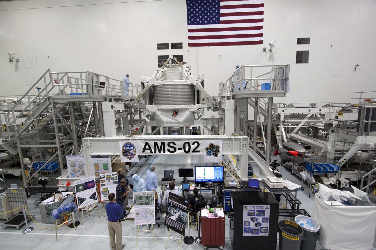 CAPE CANAVERAL, Fla. -- In the Space Station Processing Facility at NASA's Kennedy Space Center in Florida, the Alpha Magnetic Spectrometer-2 (AMS) is positioned at a 180-degree angle to provide better access for work to be performed on its avionics box. Technicians also will install a flight releasable grappling fixture to AMS while it is upside down. AMS is designed to operate as an external experiment on the International Space Station. It will use the unique environment of space to study the universe and its origin by searching for dark matter. AMS will fly to the station aboard space shuttle Endeavour's STS-134 mission targeted to launch Feb. 27, 2011. Photo credit: NASA/Jack Pfaller