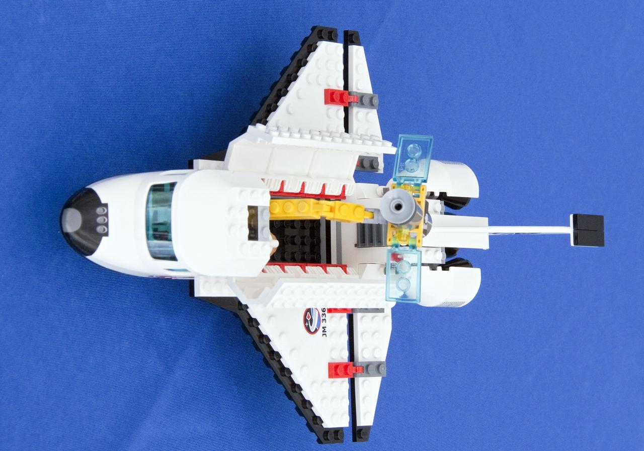 CAPE CANAVERAL, Fla. -- A space shuttle model built of LEGO bricks is on display at NASA's Kennedy Space Center in Florida, marking a new partnership between the U.S. space agency and The LEGO Group. The three-year Space Act Agreement is meant to spark the interest of children in science, technology, engineering and mathematics (STEM) with the future release of four NASA-inspired products in the toy company's LEGO CITY line.           To commemorate the beginning of the partnership, two small LEGO space shuttles will launch aboard space shuttle Discovery's STS-133 mission to the International Space Station. A 40- by 70-foot activity tent will be set up at Kennedy on Nov. 3 for children of all ages to build their vision of the future with LEGO bricks. LEGO sets also will fly to the space station aboard Endeavour's STS-134 mission, and will be put together on orbit to demonstrate the challenges faced while building things in microgravity. Photo credit: NASA/Jack Pfaller