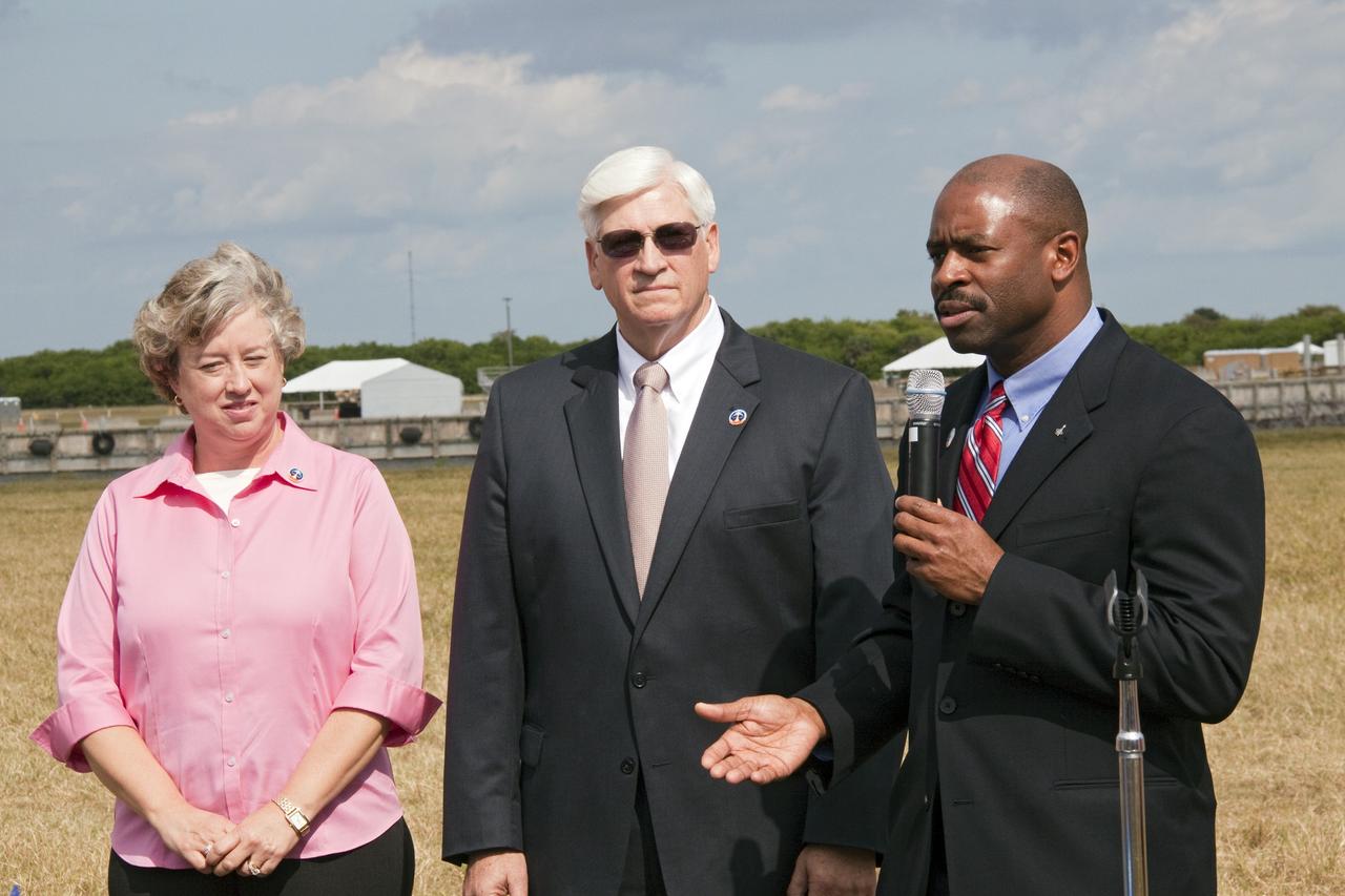 CAPE CANAVERAL, Fla. -- NASA and The LEGO Group announce a three-year Space Act Agreement meant to spark the interest of children in science, technology, engineering and mathematics (STEM) with the future release of four NASA-inspired products in the toy company's LEGO CITY line. From left, are Debbie Biggs, education specialist for International Space Station National Lab Education Projects, Stephan Turnipseed, president of LEGO Education North America, and Leland Melvin, NASA's associate administrator for Education.      To commemorate the beginning of the partnership, two small LEGO space shuttles will launch aboard space shuttle Discovery's STS-133 mission to the International Space Station. A 40- by 70-foot activity tent will be set up at Kennedy on Nov. 3 for children of all ages to build their vision of the future with LEGO bricks. LEGO sets also will fly to the space station aboard Endeavour's STS-134 mission, and will be put together on orbit to demonstrate the challenges faced while building things in microgravity. Photo credit: NASA/Jack Pfaller
