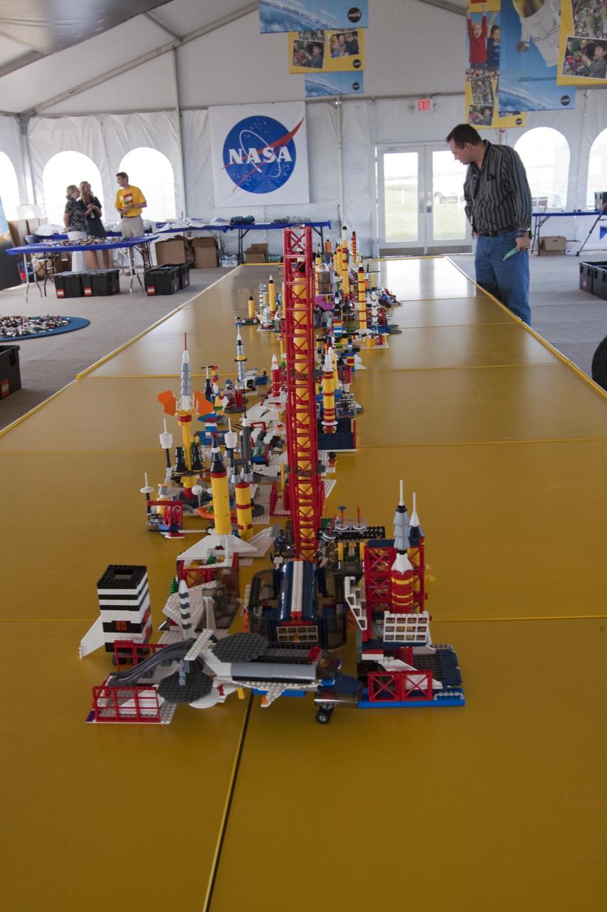 CAPE CANAVERAL, Fla. -- On the NASA Causeway at Kennedy Space Center in Florida, a 40- by 70-foot activity tent chock full of LEGO bricks is ready to welcome children of all ages. There, they will have the opportunity to build their vision of the future with LEGO bricks, marking the beginning of a three-year Space Act Agreement between NASA and The LEGO Group. The partnership is meant to spark the interest of children in science, technology, engineering and mathematics (STEM).         To commemorate the partnership, two small LEGO space shuttles will launch aboard space shuttle Discovery's STS-133 mission to the International Space Station and the company will release four NASA-inspired products in its LEGO CITY line next year. LEGO sets also will fly to the space station aboard Endeavour's STS-134 mission, and will be put together on orbit to demonstrate the challenges faced while building things in microgravity. Photo credit: NASA/Jack Pfaller