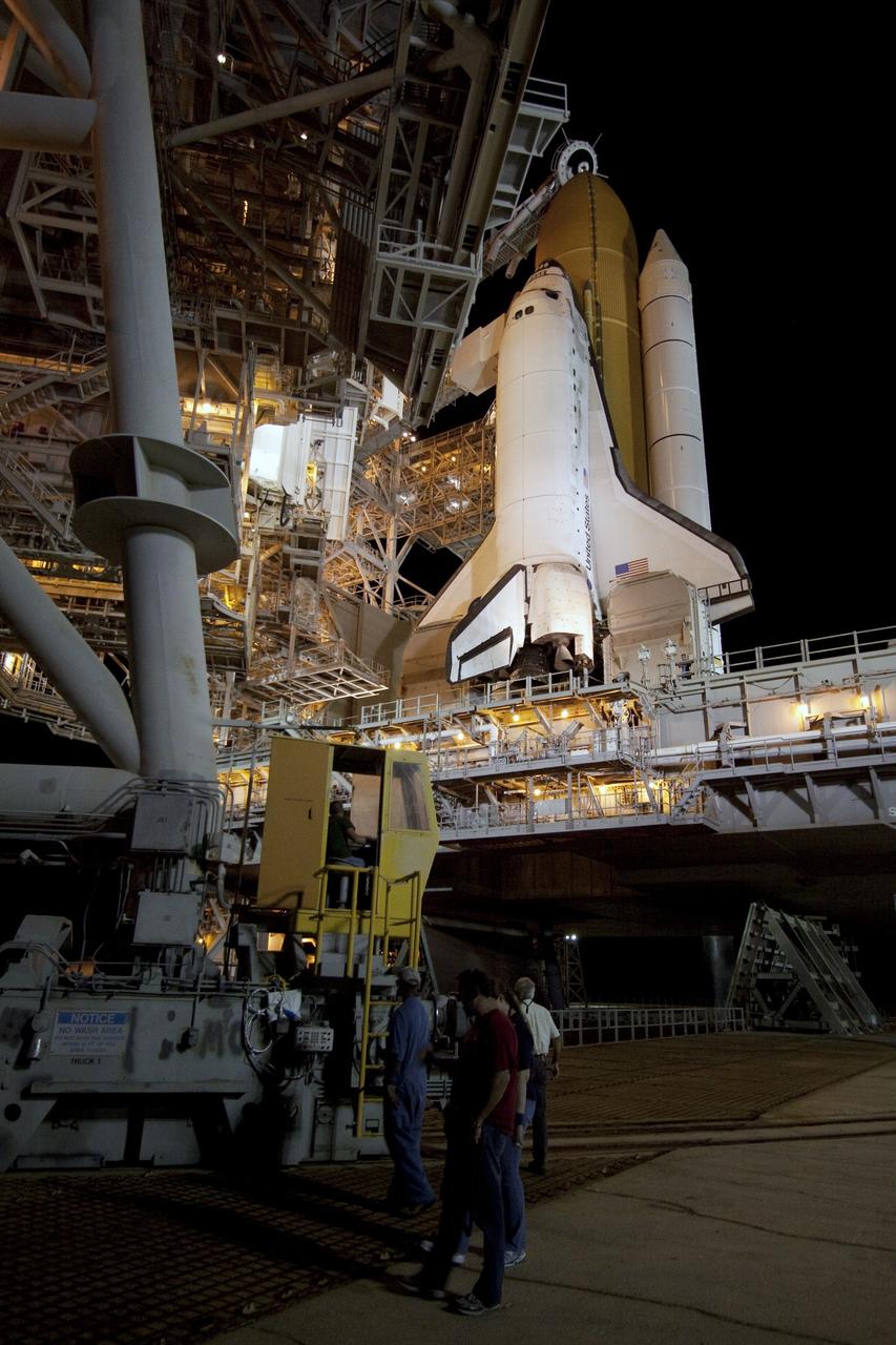 CAPE CANAVERAL, Fla. -- At NASA's Kennedy Space Center in Florida, the rotating service structure on Launch Pad 39A moves away from space shuttle Discovery. The structure provides weather protection and access to the shuttle while it awaits lift off on the pad. RSS "rollback," as it's called, was delayed for a few hours to allow a lightning-producing storm cloud to pass.         Launch of Discovery on the STS-133 mission to the International Space Station is set for 3:29 p.m. on Nov. 4. During the 11-day mission, Discovery and its six crew members will deliver the Permanent Multipurpose Module, packed with supplies and critical spare parts, as well as Robonaut 2, to the orbiting laboratory. Discovery, which will fly its 39th mission, is scheduled to be retired following STS-133. This will be the 133rd Space Shuttle Program mission and the 35th shuttle voyage to the space station. For more information on STS-133, visit www.nasa.gov/mission_pages/shuttle/shuttlemissions/sts133/. Photo credit: NASA/Jack Pfaller