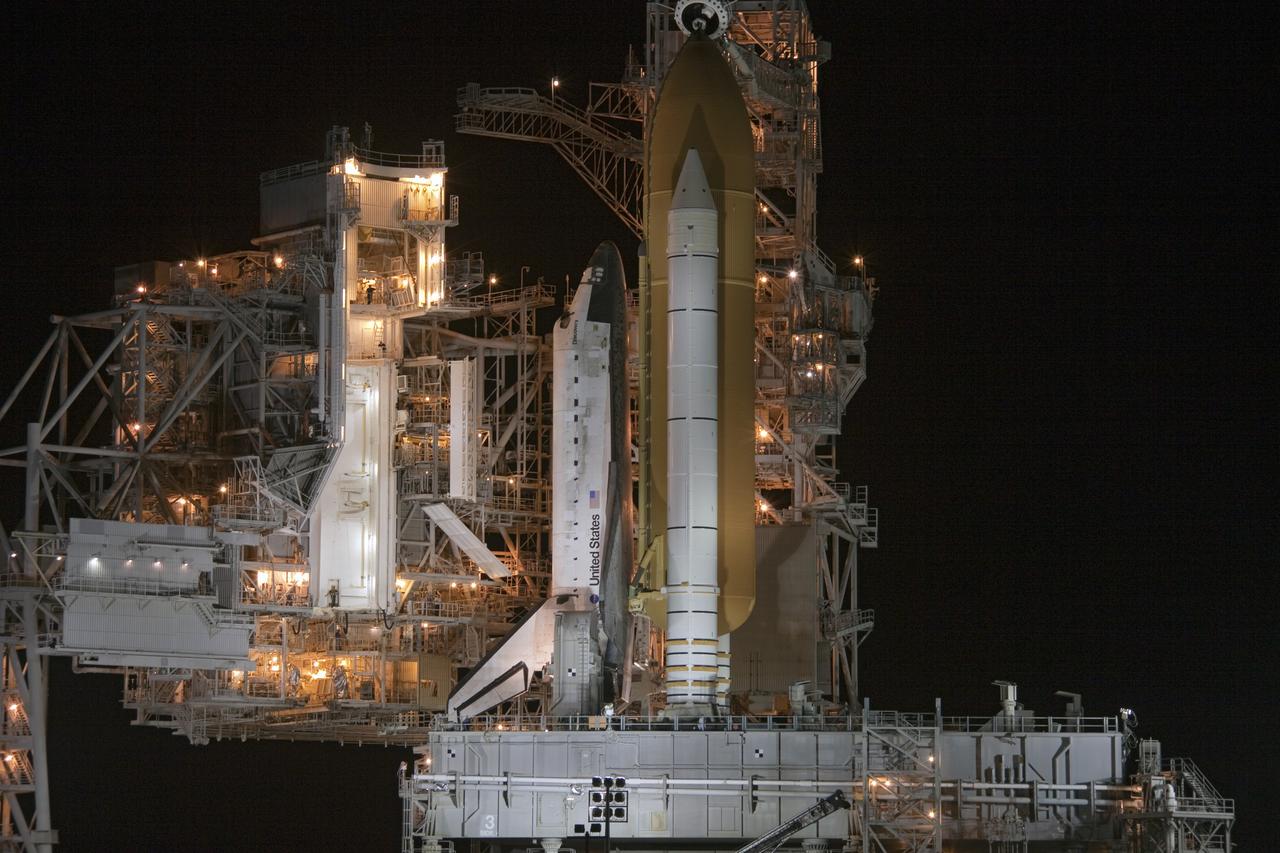 CAPE CANAVERAL, Fla. -- At NASA's Kennedy Space Center in Florida, the rotating service structure on Launch Pad 39A moves away from space shuttle Discovery. The structure provides weather protection and access to the shuttle while it awaits lift off on the pad. Launch of Discovery on the STS-133 mission to the International Space Station is set for 3:29 p.m. on Nov. 4. During the 11-day mission, Discovery and its six crew members will deliver the Permanent Multipurpose Module, packed with supplies and critical spare parts, as well as Robonaut 2, to the orbiting laboratory. Discovery, which will fly its 39th mission, is scheduled to be retired following STS-133. This will be the 133rd Space Shuttle Program mission and the 35th shuttle voyage to the space station. For more information on STS-133, visit www.nasa.gov/mission_pages/shuttle/shuttlemissions/sts133/. Photo credit: NASA/Troy Cryder