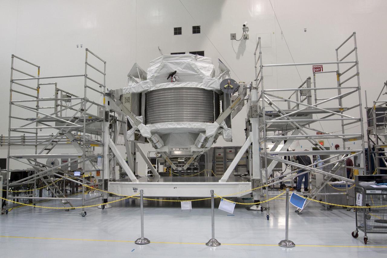 CAPE CANAVERAL, Fla. -- In the Space Station Processing Facility at NASA's Kennedy Space Center in Florida, the Alpha Magnetic Spectrometer-2 (AMS) sits in its cargo element work stand, where more processing will take place.           AMS is designed to operate as an external experiment on the International Space Station. It will use the unique environment of space to study the universe and its origin by searching for dark matter. AMS will fly to the station aboard space shuttle Endeavour's STS-134 mission targeted to launch Feb. 27, 2011. Photo credit: NASA/Jack Pfaller