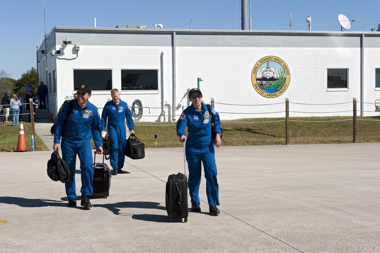 CAPE CANAVERAL, Fla. -- Space shuttle Discovery's STS-133 crew prepares to depart NASA's Kennedy Space Center in Florida in T-38 training jets. Mission Specialist Michael Barratt, left, Pilot Eric Boe and Mission Specialist Nicole Stott and their three crewmates will wait until at least Nov. 30 to launch to the International Space Station because a leak was detected at the Ground Umbilical Carrier Plate (GUCP) while Discovery's external fuel tank was being loaded for launch on Nov. 5. The GUCP is an attachment point between the external tank and a pipe that carries gaseous hydrogen safely away from the shuttle to the flare stack, where it is burned off. Engineers and managers also will evaluate a crack in the foam on the external tank.            During the 11-day mission, STS-133 will deliver the Permanent Multipurpose Module, packed with supplies and critical spare parts, as well as Robonaut 2, to the orbiting laboratory. Discovery, which will fly its 39th mission, is scheduled to be retired following STS-133. This will be the 133rd Space Shuttle Program mission and the 35th shuttle voyage to the space station. For more information on STS-133, visit www.nasa.gov/mission_pages/shuttle/shuttlemissions/sts133/. Photo credit: NASA/Kim Shiflett