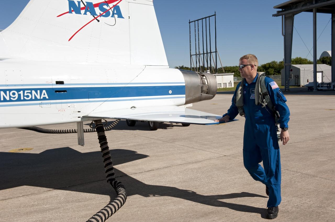 CAPE CANAVERAL, Fla. -- Space shuttle Discovery's STS-133 Pilot Eric Boe prepares to depart NASA's Kennedy Space Center in Florida in a T-38 training jet. Boe and his five crewmates will wait until at least Nov. 30 to launch to the International Space Station because a leak was detected at the Ground Umbilical Carrier Plate (GUCP) while Discovery's external fuel tank was being loaded for launch on Nov. 5. The GUCP is an attachment point between the external tank and a pipe that carries gaseous hydrogen safely away from the shuttle to the flare stack, where it is burned off. Engineers and managers also will evaluate a crack in the foam on the external tank.        During the 11-day mission, STS-133 will deliver the Permanent Multipurpose Module, packed with supplies and critical spare parts, as well as Robonaut 2, to the orbiting laboratory. Discovery, which will fly its 39th mission, is scheduled to be retired following STS-133. This will be the 133rd Space Shuttle Program mission and the 35th shuttle voyage to the space station. For more information on STS-133, visit www.nasa.gov/mission_pages/shuttle/shuttlemissions/sts133/. Photo credit: NASA/Kim Shiflett