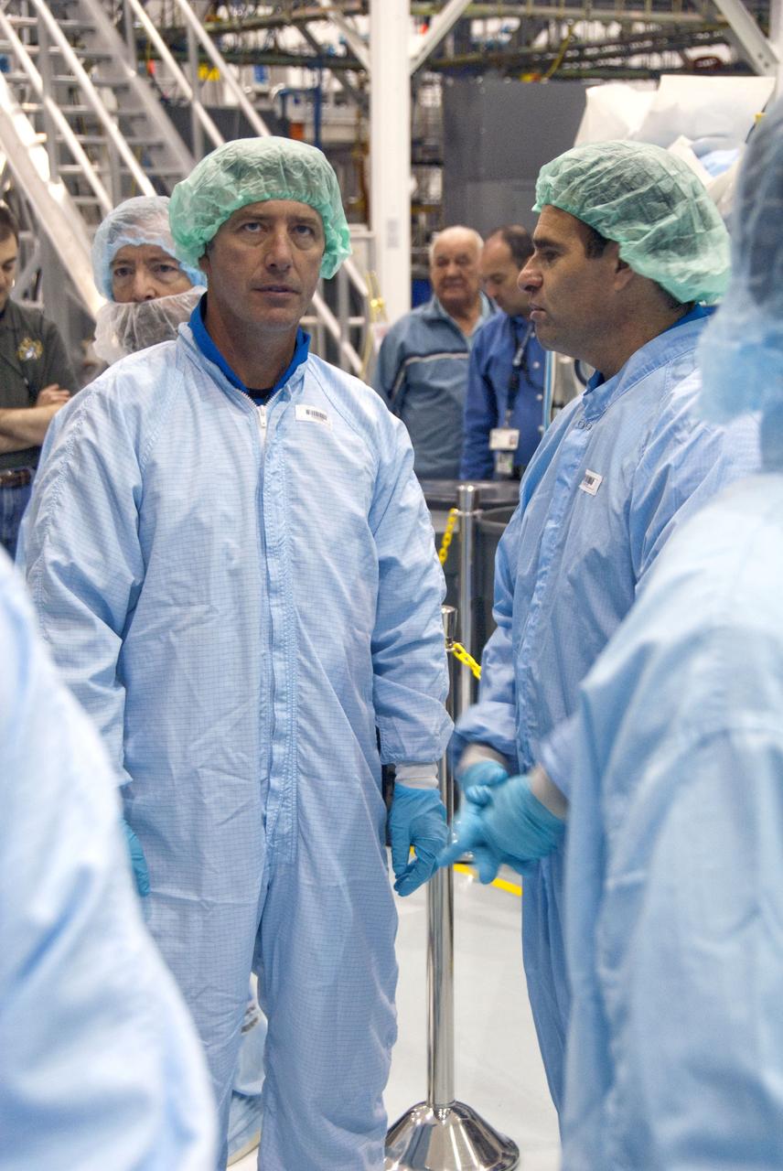 CAPE CANAVERAL, Fla. -- In the Space Station Processing Facility at NASA's Kennedy Space Center in Florida, STS-134 Mission Specialists Roberto Vittori, front left, and Greg Chamitoff check out the Alpha Magnetic Spectrometer-2 (AMS) with the experiment's technicians. The six-member STS-134 crew is at Kennedy participating in the Crew Equipment Interface Test (CEIT), which gives them an opportunity for hands-on training with tools they'll be using in space and familiarization of the payload they'll be delivering to the International Space Station.              Space shuttle Endeavour is targeted to launch on the STS-134 mission Feb. 27, 2011. For more information, visit www.nasa.gov/mission_pages/shuttle/shuttlemissions/sts134/index.html. Photo credit: NASA/Cory Huston