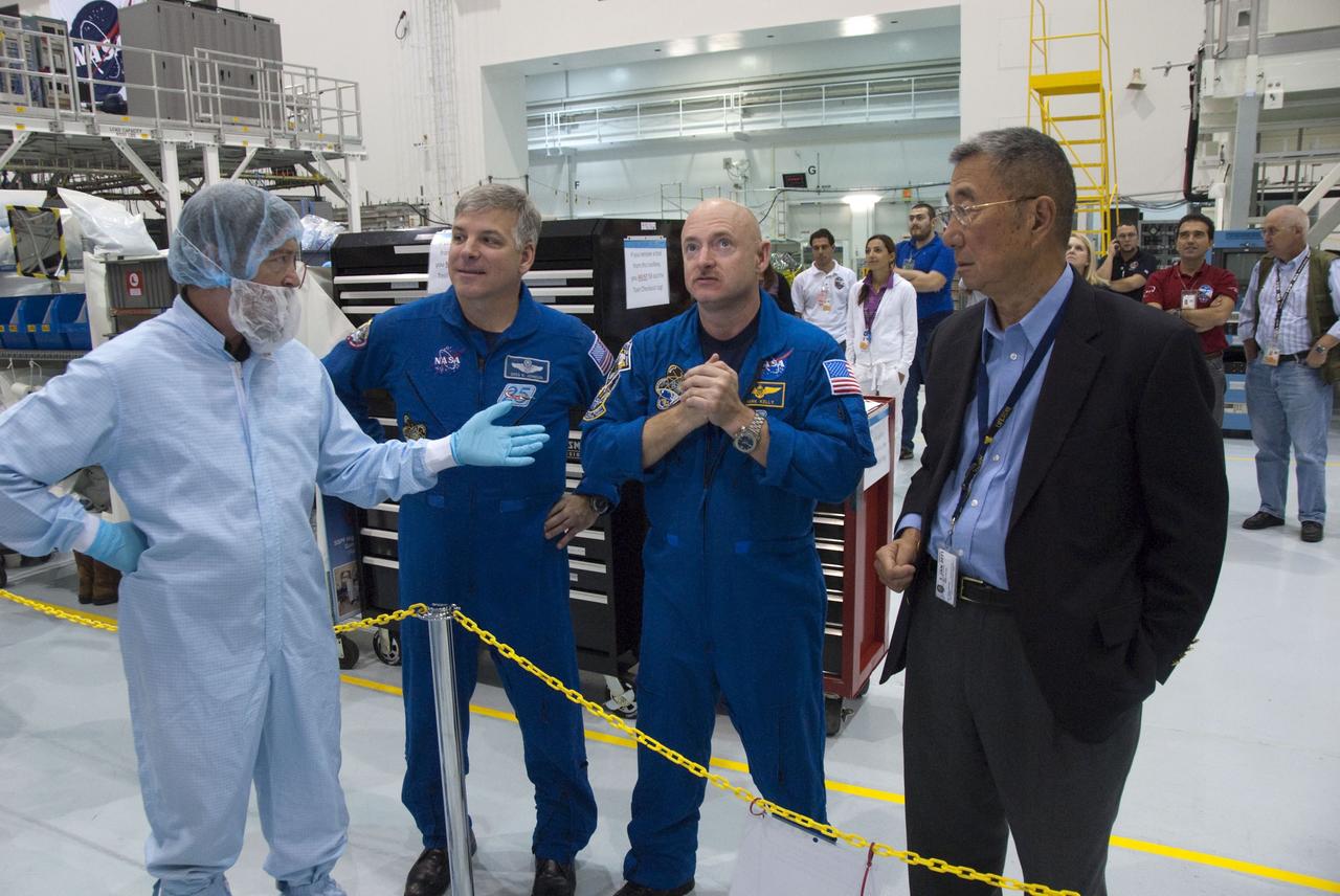 CAPE CANAVERAL, Fla. -- In the Space Station Processing Facility at NASA's Kennedy Space Center in Florida, a technician, left, talks about the Alpha Magnetic Spectrometer-2 (AMS) with STS-134 Pilot Gregory H. Johnson, Commander Mark Kelly and the experiment's principal investigator, Prof. Samuel Ting. The six-member STS-134 crew is at Kennedy participating in the Crew Equipment Interface Test (CEIT), which gives them an opportunity for hands-on training with tools they'll be using in space and familiarization of the payload they'll be delivering to the International Space Station.                Space shuttle Endeavour is targeted to launch on the STS-134 mission Feb. 27, 2011. For more information, visit www.nasa.gov/mission_pages/shuttle/shuttlemissions/sts134/index.html. Photo credit: NASA/Cory Huston