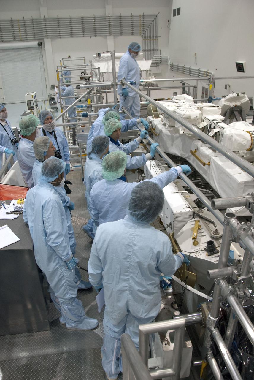 CAPE CANAVERAL, Fla. -- In the Space Station Processing Facility at NASA's Kennedy Space Center in Florida, STS-134 crew members inspect the Express Logistics Carrier-3 with the carrier's technicians. The six-member crew is at Kennedy participating in the Crew Equipment Interface Test (CEIT), which gives them an opportunity for hands-on training with tools they'll be using in space and familiarization of the payload they'll be delivering to the International Space Station.               Space shuttle Endeavour is targeted to launch on the STS-134 mission Feb. 27, 2011. For more information, visit www.nasa.gov/mission_pages/shuttle/shuttlemissions/sts134/index.html. Photo credit: NASA/Cory Huston