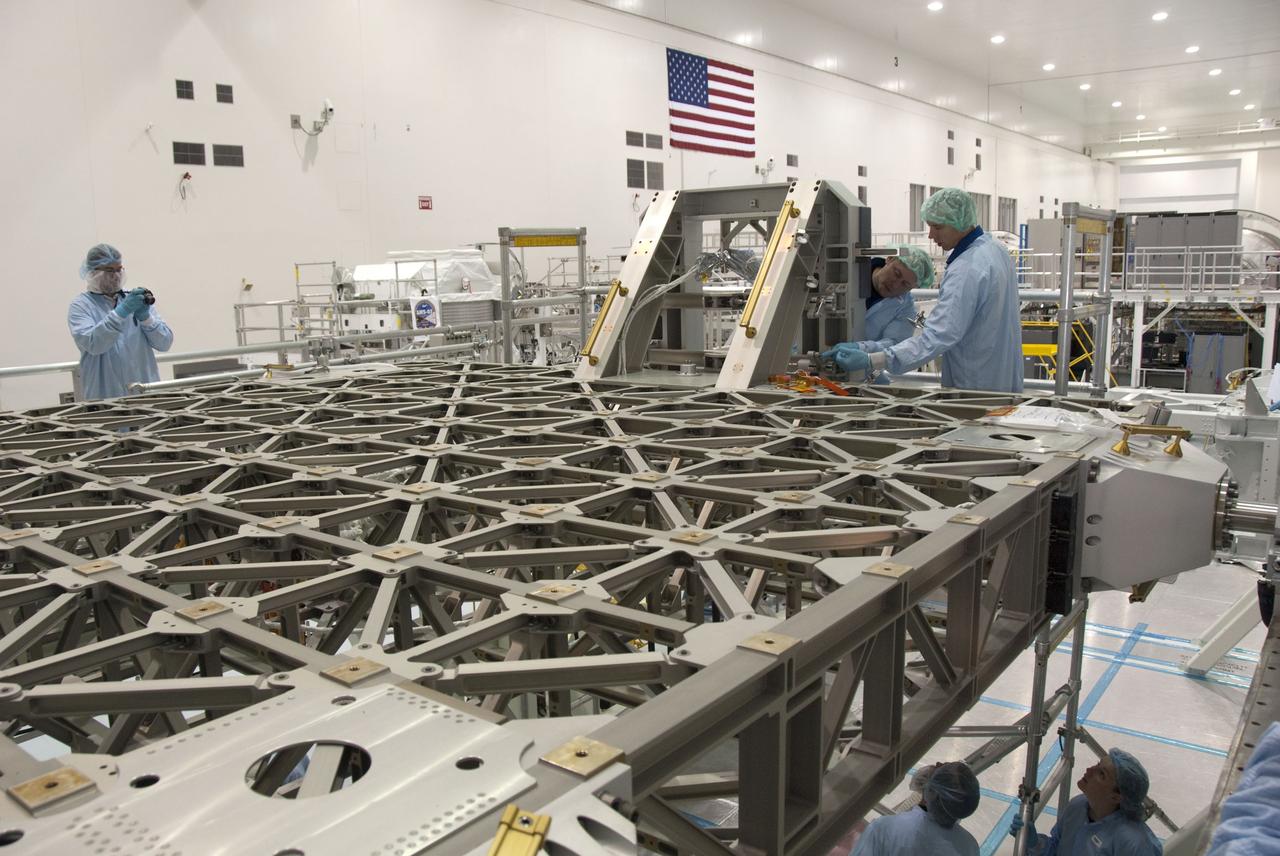 CAPE CANAVERAL, Fla. -- In the Space Station Processing Facility at NASA's Kennedy Space Center in Florida, STS-134 crew members inspect the Express Logistics Carrier-3 with the carrier's technicians. The six-member crew is at Kennedy participating in the Crew Equipment Interface Test (CEIT), which gives them an opportunity for hands-on training with tools they'll be using in space and familiarization of the payload they'll be delivering to the International Space Station.                Space shuttle Endeavour is targeted to launch on the STS-134 mission Feb. 27, 2011. For more information, visit www.nasa.gov/mission_pages/shuttle/shuttlemissions/sts134/index.html. Photo credit: NASA/Cory Huston