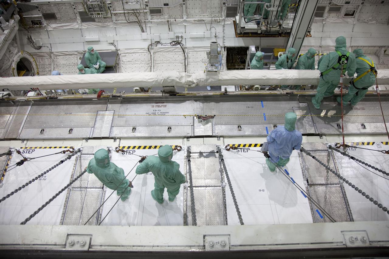 CAPE CANAVERAL, Fla. -- In the Orbiter Processing Facility-2 at NASA's Kennedy Space Center in Florida, the STS-134 crew and technicians check out space shuttle Endeavour's payload bay. The six STS-134 astronauts are participating in the Crew Equipment Interface Test (CEIT), which gives them an opportunity for hands-on training with the tools and equipment they'll use in space and familiarization of the payload they'll be delivering to the International Space Station.       Endeavour is targeted to launch on the STS-134 mission Feb. 27, 2011. For more information, visit www.nasa.gov/mission_pages/shuttle/shuttlemissions/sts134/index.html. Photo credit: NASA/Frankie Martin
