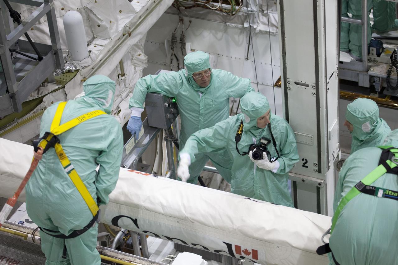 CAPE CANAVERAL, Fla. -- In the Orbiter Processing Facility-2 at NASA's Kennedy Space Center in Florida, the STS-134 crew and technicians check out space shuttle Endeavour's payload bay. The six STS-134 astronauts are participating in the Crew Equipment Interface Test (CEIT), which gives them an opportunity for hands-on training with the tools and equipment they'll use in space and familiarization of the payload they'll be delivering to the International Space Station.       Endeavour is targeted to launch on the STS-134 mission Feb. 27, 2011. For more information, visit www.nasa.gov/mission_pages/shuttle/shuttlemissions/sts134/index.html. Photo credit: NASA/Frankie Martin