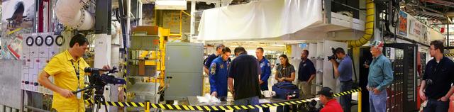 CAPE CANAVERAL, Fla. -- In the Orbiter Processing Facility-2 at NASA's Kennedy Space Center in Florida, STS-134 crew members check out the tools and equipment they'll be using in space. Space shuttle Endeavour's six astronauts are participating in the Crew Equipment Interface Test (CEIT), which gives them an opportunity for hands-on training and familiarization of the payload they'll be delivering to the International Space Station.      Endeavour is targeted to launch on the STS-134 mission Feb. 27, 2011. For more information, visit www.nasa.gov/mission_pages/shuttle/shuttlemissions/sts134/index.html. Photo credit: NASA/Frankie Martin