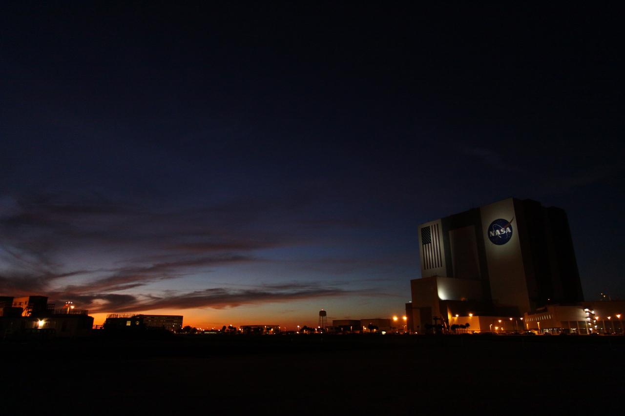 CAPE CANAVERAL, Fla. -- At NASA's Kennedy Space Center in Florida, the sunset casts beautiful hues in the sky over the Vehicle Assembly Building. Photo credit: NASA/Jack Pfaller