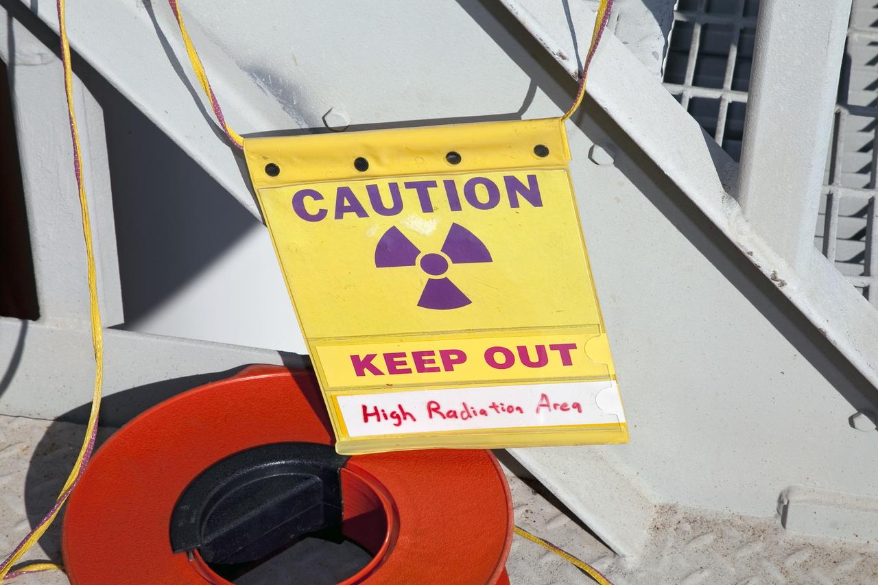 CAPE CANAVERAL, Fla. -- A backscatter device is being used to examine space shuttle Discovery's external fuel tank on Launch Pad 39A at NASA's Kennedy Space Center in Florida. The device bounces radiation off the tank, allowing technicians to see under the tank's foam insulation. The foam cracked during initial loading operations for Discovery’s STS-133 launch attempt on Nov. 5, and technicians later identified two cracked stringers, which are the composite aluminum ribs located vertically on the tank’s intertank area. Those two stringers have been replaced and reinforced with doublers, which are shaped metal pieces twice as thick as the original stringers.          Launch is no earlier than Dec. 17 at 8:51 p.m. EST. For more information on STS-133, visit www.nasa.gov/mission_pages/shuttle/shuttlemissions/sts133/. Photo credit: NASA/Frank Michaux
