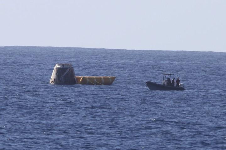 CAPE CANAVERAL, Fla. -- The Dragon capsule that launched from Launch Complex-40 at Cape Canaveral Air Force Station aboard a SpaceX Falcon 9 rocket is recovered in the Pacific Ocean about 500 miles west of the coast of Mexico. The rocket lifted off at 10:43 a.m. EST. The spacecraft went through several maneuvers before it re-entered the atmosphere and splashed down at about 2 p.m. EST.       This is first demonstration flight for NASA's Commercial Orbital Transportation Services (COTS) program, which will provide cargo flights to the International Space Station in the future. Photo credit: Courtesy SpaceX