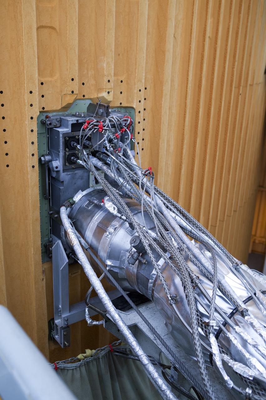 CAPE CANAVERAL, Fla. -- Space shuttle Discovery's external fuel tank is being prepared for a tanking test no earlier than Dec. 15 on Launch Pad 39A at NASA's Kennedy Space Center in Florida. During the test, engineers will monitor what happens to the newly replaced ground umbilical carrier plate (GUCP) and the intertank's stringers, which are 21-foot long, U-shaped aluminum brackets, during loading of cryogenic propellants.     Discovery's first launch attempt for STS-133 was scrubbed in early November due to a hydrogen gas leak at GUCP. The next launch opportunity is no earlier than Feb. 3, 2011. For more information on STS-133, visit www.nasa.gov/mission_pages/shuttle/shuttlemissions/sts133/. Photo credit: NASA/Ben Smegelsky