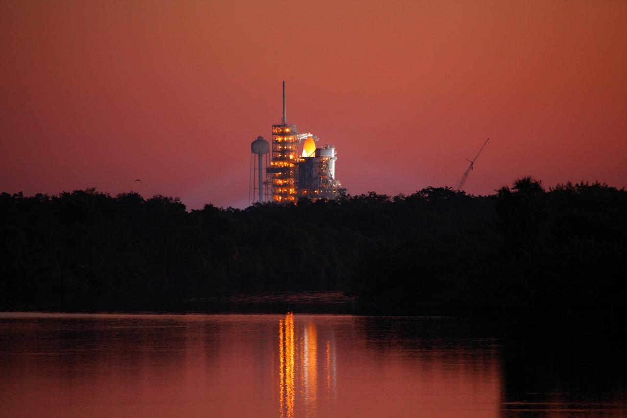CAPE CANAVERAL, Fla. -- Space shuttle Discovery's external fuel tank is being filled with more than 535,000 gallons of super-cold liquid hydrogen and liquid oxygen during a tanking test on Launch Pad 39A at NASA's Kennedy Space Center in Florida. Engineers are closely monitoring what happens to 21-foot long, U-shaped aluminum brackets, called stringers, located at the tank's intertank region, as well as the newly replaced ground umbilical carrier plate (GUCP). Data from 89 sensors will be evaluated after the tank returns to ambient temperature. In order to perform additional analysis on the tank, Discovery will be rolled back to the Vehicle Assembly Building, a move that is planned for next week. Discovery's first launch attempt for STS-133 was scrubbed in early November due to a hydrogen gas leak at GUCP. The next launch opportunity is no earlier than Feb. 3, 2011. For more information on STS-133, visit www.nasa.gov/mission_pages/shuttle/shuttlemissions/sts133/. Photo credit: NASA/Frank Michaux
