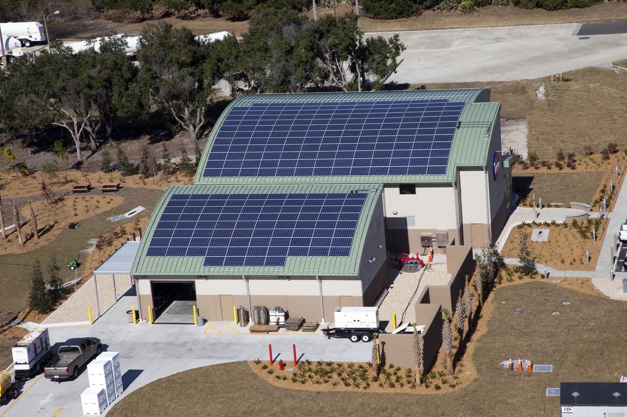 CAPE CANAVERAL, Fla. -- The Propellants North Administrative and Maintenance Facility in the Launch Complex 39 area of NASA's Kennedy Space Center in Florida is ready for business. The environmentally friendly facility is slated to be NASA's second Platinum-rated by the U.S. Green Building Council's (USGBC) Leadership in Environmental and Energy Design (LEED) certification system. It will be the space agency's first carbon-neutral facility, which means it will produce enough energy onsite from renewable sources to offset what it requires to operate. The facility consists of a two-story administrative building, which will house managers, mechanics and technicians who fuel spacecraft at Kennedy, and a single-story shop that will be used to store cryogenic fuel transfer equipment. Photo credit: NASA/Frank Michaux